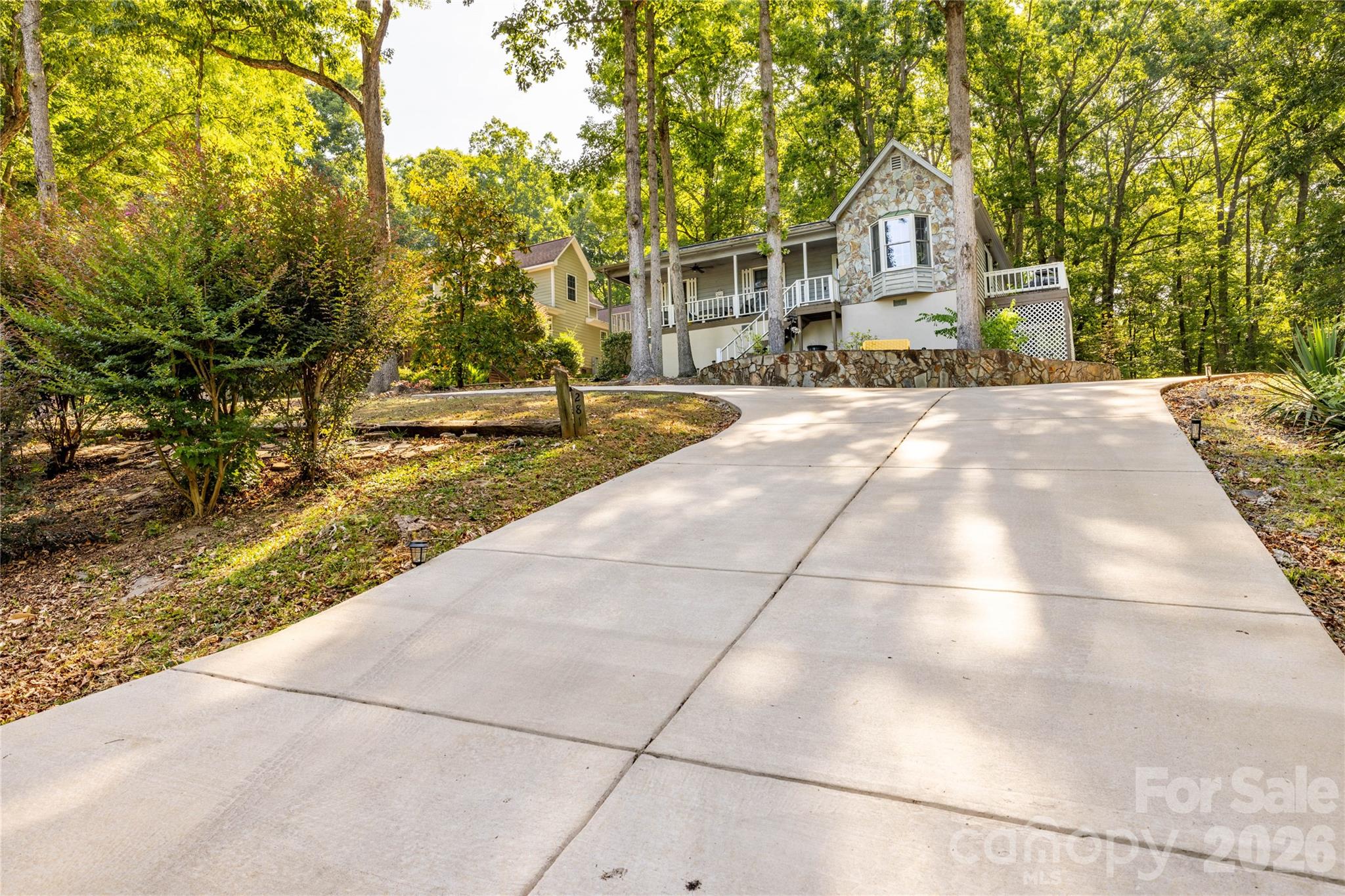 Experience the charm of Lake Tillery living in this beautifully appointed, fully furnished 3 bedroom 2 bath ranch style retreat located within the highly desirable Woodrun Association. Offering seasonal water views and a turn key lifestyle, this exceptional property is equally suited as a luxury weekend escape, full time residence, or income producing vacation rental, with short term rentals permitted. Designed for comfort and effortless entertaining, the home features inviting living spaces, a functional floor plan, and tasteful furnishings that allow you to begin enjoying the lake lifestyle immediately. From morning coffee overlooking the natural beauty of the community to evenings spent relaxing after a day on the water, this home embodies the laid back elegance that makes Lake Tillery such a sought after destination. A unique bonus is the clean, well maintained crawlspace with abundant storage and workspace potential. Whether you envision a workshop, hobby area, outdoor equipment storage, or additional organizational space, this versatile area offers endless possibilities. Enjoy an array of amenities, including a waterfront swimming pool overlooking Lake Tillery, pickleball courts, walking trails, a convenient community dumpster, boat slips, and security. Whether you're seeking a refined lakeside retreat, a year round residence, or an investment property with strong vacation rental potential, this move in ready home delivers an exceptional combination of comfort, flexibility, and community amenities in one of Lake Tillery's desirable neighborhoods. Luxury, convenience, and the lake lifestyle you've been dreaming of welcome home to Woodrun.