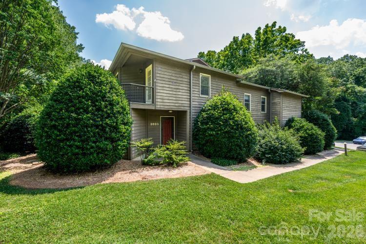 Newly listed end unit condo in the desirable Colony Crossing community in the heart of SouthPark! This move in ready, true two story home offers 2 bedrooms, 2 full bathrooms, and 1 half bath with an open floor plan designed for comfortable living. The updated kitchen features granite countertops, a stylish backsplash, GE stainless steel appliances, a single basin sink, and a convenient pass through to the living area.

The spacious living room showcases hardwood floors, a cozy brick framed fireplace, updated lighting and fixtures, and an entertainment bar with ceramic tile accents. Upstairs, the owner's suite includes a walk in closet and a private balcony overlooking the mature trees, while the main level brick patio provides another peaceful outdoor retreat for relaxing or birdwatching.

Additional highlights include new HVAC (late 2025), updated 2 inch blinds throughout, and abundant natural light from this desirable corner location. Conveniently located across from the community pool and clubhouse, Colony Crossing offers a tranquil, tree lined setting while being just minutes from SouthPark's premier shopping, dining, and entertainment.