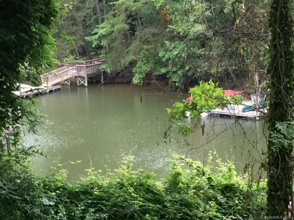 Want to build your dream home on Lake Wylie?  Here's your chance!  This wooded homesite provides the perfect opportunity to wake up in the morning with a view of the water!  The lot right beside this one is also available for purchase.  (Lot 45)  Priced to sell quickly!