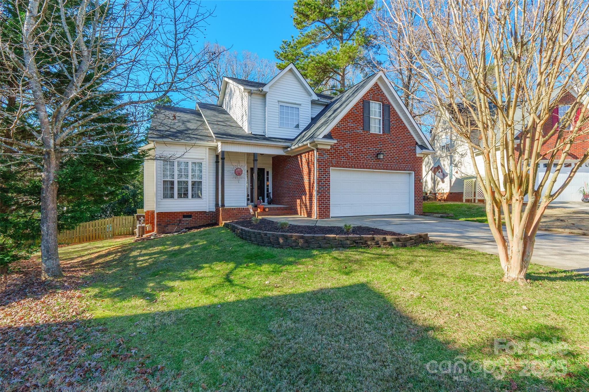 This gorgeous 3 BD, 2.5 BA home captures your attention with beautiful wood floors that flow throughout the main living areas, creating a warm atmosphere from the moment you enter. The great room boasts vaulted ceilings and a cozy fireplace. The spacious kitchen, equipped with SS appliances, connects to the dining area, where sliding doors lead to the deck—perfect for entertaining. A half bath is located on the main level, while all bedrooms are upstairs for added privacy. The primary suite features a huge walk-in closet, and attic access leads to a 15x15 storage space. The fully fenced yard is stunning, featuring a deck that flows into the outdoor space. The highlight of the large wooded lot is the heated inground pool, complemented by an additional deck for relaxing. A firepit enhances the ambiance, making it ideal for year-round enjoyment. The home also boasts HVAC with 2 units. Plus, there’s no HOA, giving you the freedom to make this space your own. This home is truly a gem!