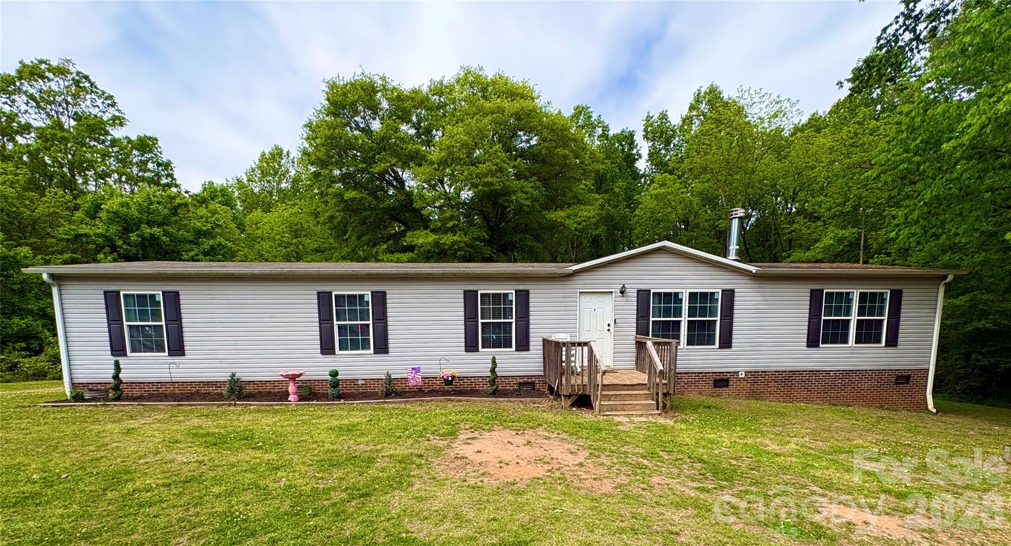 Welcome to this generously sized 4 bedroom/2 bathroom home offering comfort, space and versatility! Featuring two separate living areas, spacious bedrooms and large eat in kitchen. Situated on a large lot with private backyard and huge deck with gazebo and TV, great for entertaining! Conveniently located with easy access to Gastonia, Kings Mountain or Shelby. 
Seller offering $2000 carpet allowance with acceptable offer. 
Motivated seller! Call today to schedule showing!