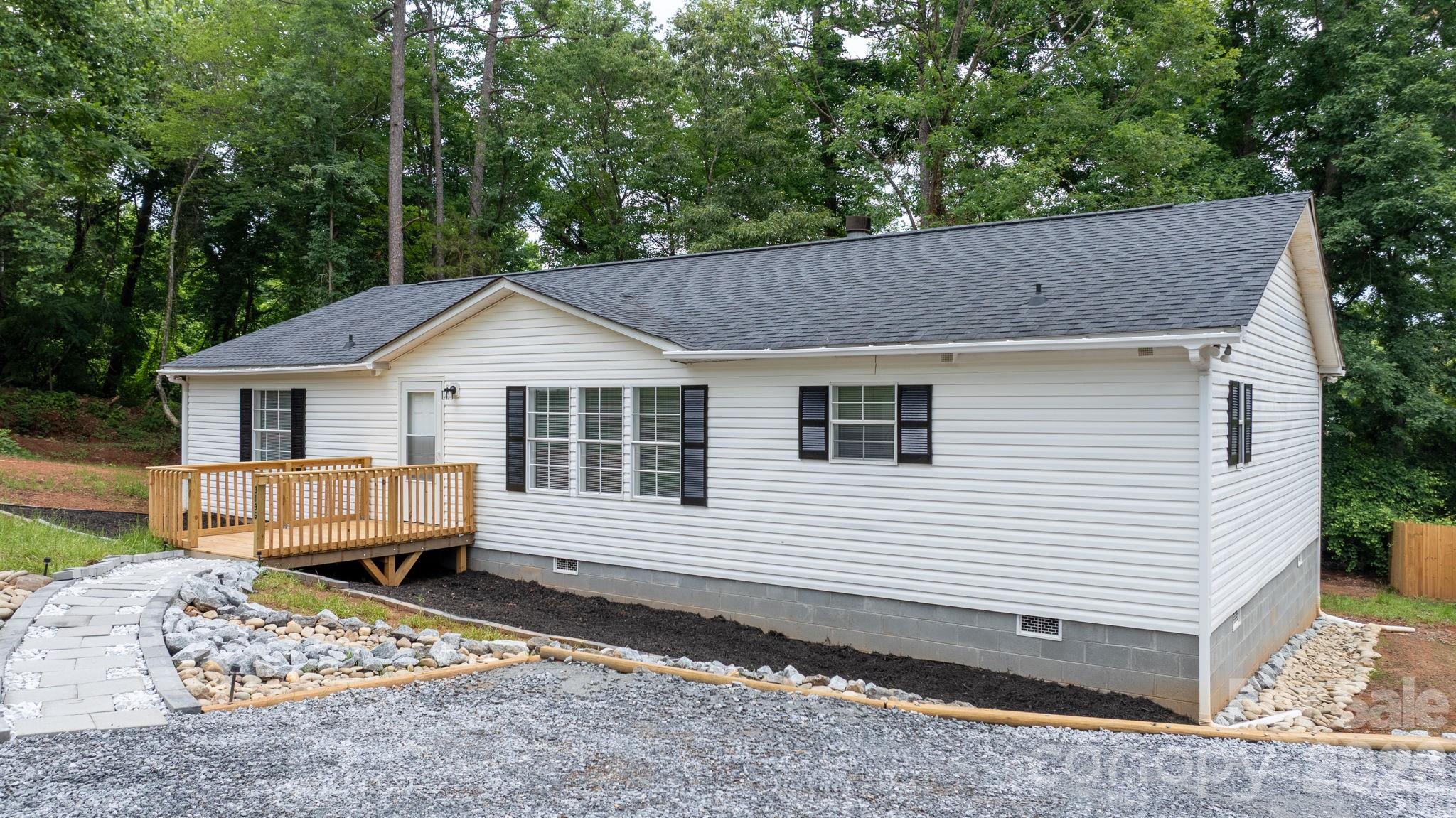 Newly updated 3-bedroom, 2-bath home in Granite Falls situated on approximately 0.41 acres. This home offers comfortable living with a functional layout and a bright, open feel. Recent updates include fresh paint, new lighting, flooring, and countertops throughout. The living area includes a cozy wood-burning fireplace, perfect for relaxing evenings. Conveniently located to local amenities, this property is move-in ready.