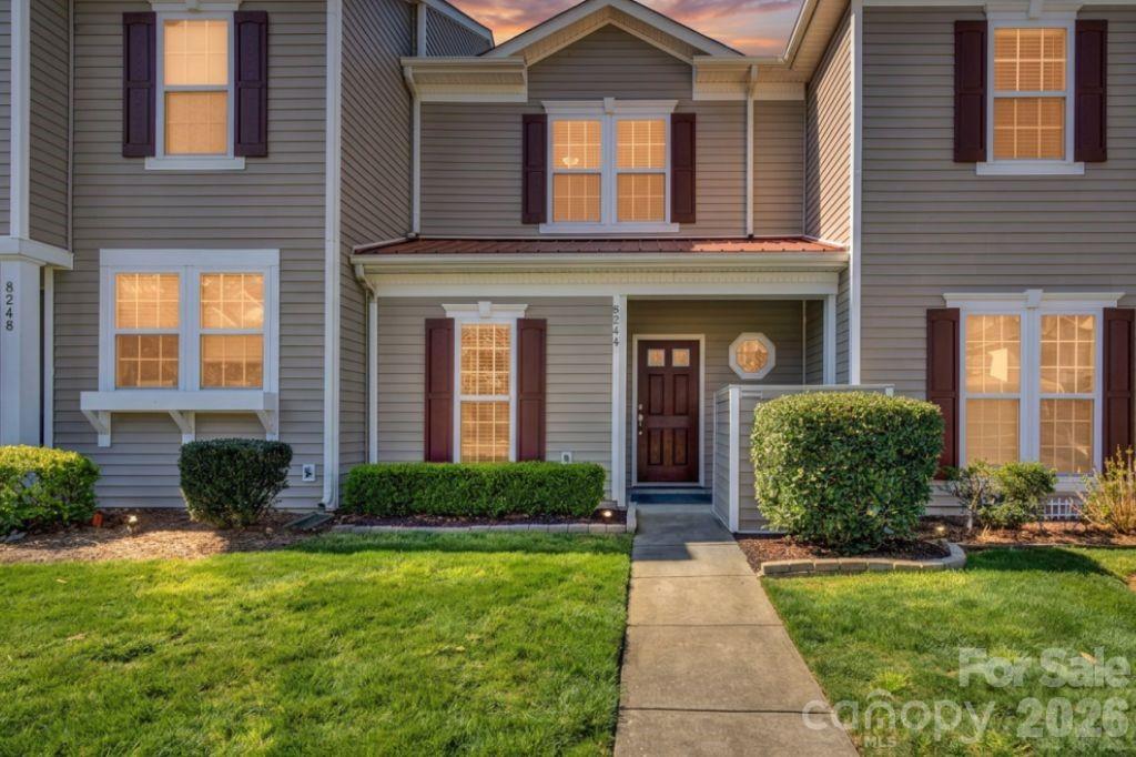 Charming 2-bed, 2.5-bath townhome in the desirable Kingstree community! Each bedroom features a private ensuite bath, plus a convenient half bath on the main level for guests. The open living and dining areas flow seamlessly into the kitchen, creating a comfortable space for everyday living and entertaining. Enjoy your own private fenced patio that backs to woods, offering added privacy and a peaceful setting for relaxing or hosting. Experience low-maintenance living with lawn maintenance included, plus access to community amenities featuring a pool and playground. Roof maintenance and trash pickup is included in the HOA fee. Conveniently located near I-485, shopping, and dining, this home is also just 5 minutes from Harrisburg Road Park and 10 minutes from Reedy Creek Nature Preserve, offering 700+ acres of trails, ponds, disc golf, a nature center, and more. A fantastic location and lifestyle opportunity—this one is a must see!