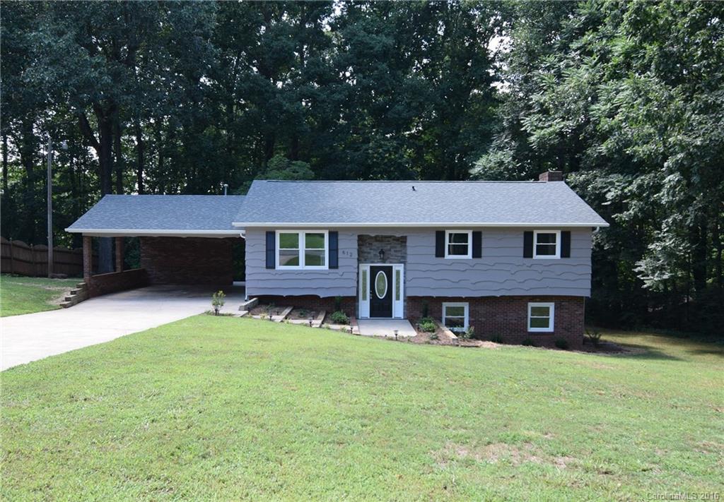Extensively remodeled, 4 bedroom, 2 bath, split-foyer home with all the upgrades you could want!  Solid, red oak hardwood floors, new kitchen cabinets, granite countertops and stainless appliances.  Both bathrooms have carrera marble vanities and beautiful tiled showers.  Wood burning fireplace in the downstairs, which also has a new HVAC unit.  New 30-year architectural shingled roof!  New deck overlooks a tranquil backyard- perfect for entertaining.  This house is a must see!