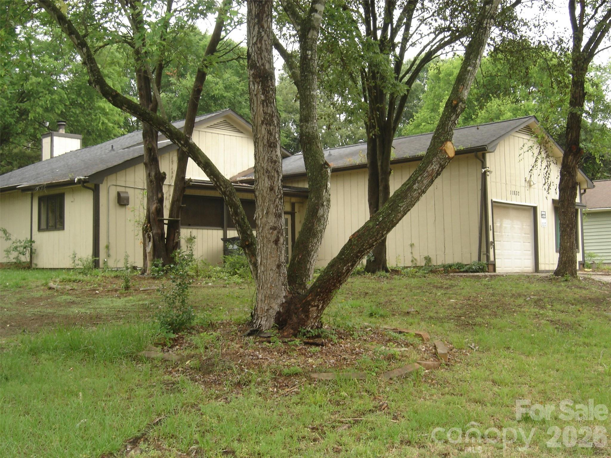 Looking for a fixer upper?  Calling all investors, builders, and visionaries! This Charlotte property is packed with potential and ready for its next chapter. Situated on a spacious lot with mature trees and an existing detached outbuilding/workshop, this property offers endless possibilities for a full renovation project or complete teardown and new construction.

The home is in need of significant repairs and updates and is being sold as-is. 

Whether you’re looking for your next flip, rental investment, or a lot to build a brand-new home in a growing Charlotte area, this property is worth a look. Conveniently located near shopping, dining, major roadways, and everything Charlotte has to offer.

?? Property requires extensive renovation and may not qualify for traditional financing. Sold strictly as-is.