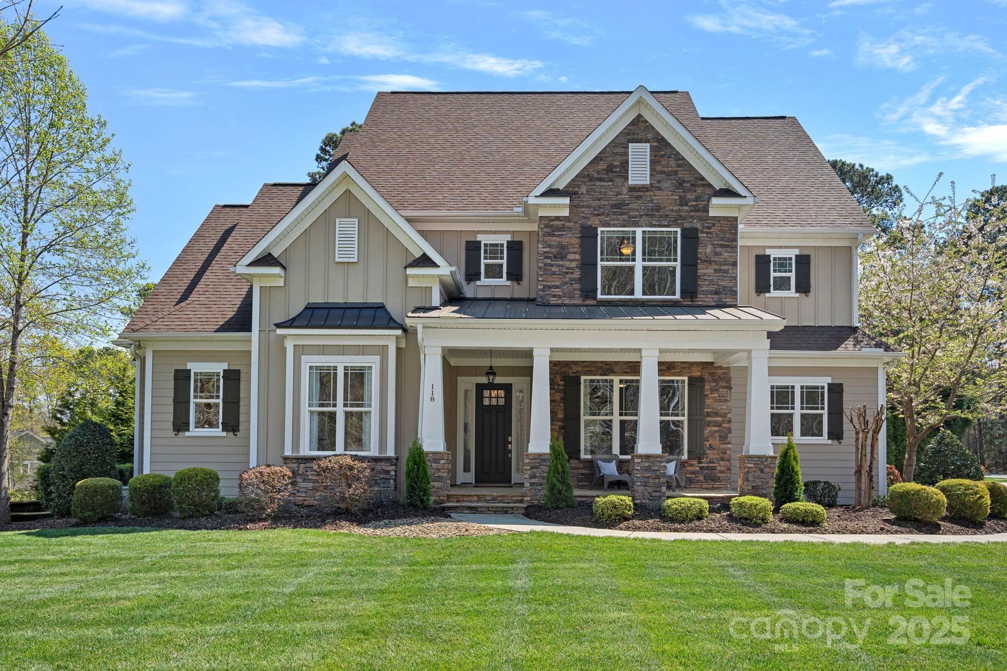 Welcome to 118 Grasshopper Circle where you will find timeless architecture and move-in ready finishes in one of Mooresville’s most desirable neighborhoods, The Farms! From the spacious open floor plan to the multitude of flex spaces, this home offers the best in comfortable living and classic design. The kitchen features stylish white cabinetry with quartz tops, beveled white backsplash, pot filler, huge center island and large walk-in pantry. Use the additional flex space on the main level to fit your lifestyle including a home office, playroom, or formal dining room. Main level primary suite while additional three bedrooms, bonus room, huge laundry room, and additional flex space are upstairs. This expansive corner lot features mature trees and landscaping, outdoor covered porch with bar, 3-car garage, and room for a pool! Enjoy The Farms’ nearby amenities including clubhouse, pool, tennis courts and more, all nestled within easy access to the shores of Lake Norman!
