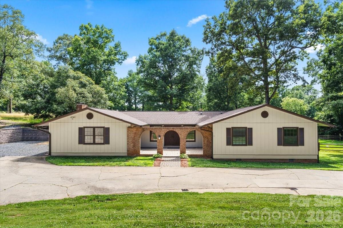 Welcome to this spacious ranch home in the highly desirable Catawba Springs community! Offering over 2,400 square feet of thoughtfully designed one-level living, this beautifully updated home features 4 bedrooms, 3 full bathrooms, and a versatile floor plan that combines comfort, functionality, and space for everyone.

Inside, you'll find multiple living areas perfect for entertaining or everyday living, including a spacious family room, a cozy gathering area with a brick fireplace, and a flexible fourth bedroom that also makes an ideal home office, guest room, or playroom. The generous layout provides room to spread out while maintaining the warmth and charm of ranch-style living.

Step outside to your own private backyard retreat. The covered patio with an outdoor fireplace is the perfect place to enjoy your morning coffee, host family gatherings, grill with friends, or unwind after a long day. The spacious backyard offers plenty of room for kids, pets, gardening, or simply enjoying the outdoors.

Additional highlights include generously sized bedrooms, a circular driveway, mature landscaping, and a convenient location just minutes from shopping, dining, schools, and everything Hickory has to offer.

If you've been searching for a home with space to live, entertain, and create lasting memories, this is one you won't want to miss. Schedule your private showing today!