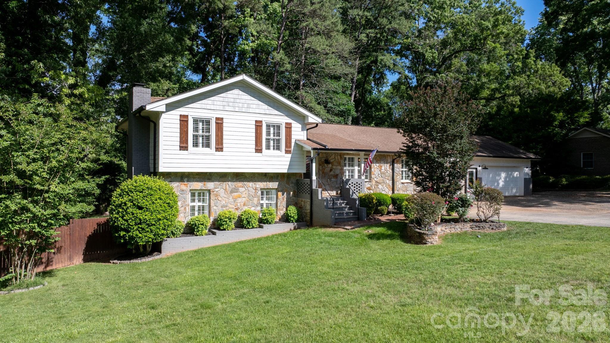 Charming 4-Bedroom Home on over half an Acre in Established Matthews Neighborhood | No HOA
Welcome to this inviting 4-bedroom, 2-bathroom home nestled in one of Matthews' most well-established neighborhoods. Thoughtfully designed as a split-level, this home features two bedrooms and one bath on each level, offering ideal privacy and flexible living. Situated on approximately 3/4 of an acre, this property offers the rare combination of space, privacy, and classic neighborhood charm all with no HOA, giving you the freedom to truly make it your own.
Step inside to discover a home filled with warmth and character, designed for comfortable everyday living and effortless entertaining. The spacious layout flows seamlessly, providing the perfect backdrop for family gatherings, quiet evenings, or hosting friends. Outside, mature trees frame the expansive lot, creating a peaceful retreat ideal for relaxing, gardening, or simply enjoying the serene surroundings.
Thoughtful features include a spacious two-car garage, a hardwired security system for added peace of mind, and for the new owner a 1-year home warranty and 1-year AC maintenance package are included.
The Matthews Lifestyle:
Life in Matthews offers the perfect balance of small-town charm and big-city accessibility. Spend your weekends exploring local coffee shops, boutiques, breweries, and the beloved farmers market. Enjoy seasonal festivals that bring the community together and give this town its welcoming, hometown feel. When you're ready for more, Uptown Charlotte is less than 30 minutes away, offering world-class dining, nightlife, professional sports, and endless cultural attractions.
Conveniently located near major interstates, commuting is effortless and Charlotte Douglas International Airport is just a short drive away. Lake days, family adventures, Carowinds, and date nights in the city, everything is within easy reach.
This is more than a home, it's a lifestyle filled with charm, convenience, and connection. Schedule your private tour today!