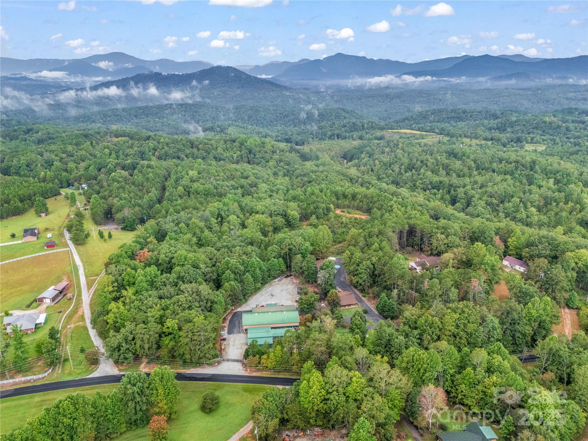 Beautiful 17+ acre forested property perfectly positioned between Rutherfordton and Lake Lure, NC! This property offers the ideal blend of serenity and convenience. Imagine building your home back from the road, where towering trees surround you and privacy is abundant. Paved road frontage leads to the driveway for easy access year-round, while the acreage provides multiple potential homesites, hiking trails, and space for gardens, animals, or a private retreat. Despite the peaceful, secluded feel, you’re just minutes from local shops, restaurants, schools, and the charm of Rutherfordton and Lake Lure’s outdoor recreation. This is your opportunity to create a sanctuary where you can unwind.
