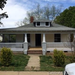 Totally restored beyond it's original charm and space. Beautiful original hardwood floors have all been refinished. Covered wrap around porch. Extended brick paver patio in large back yard, perfect for entertaining with an landscaping surrounding fence. Paved driveway in the back with plenty of parking.