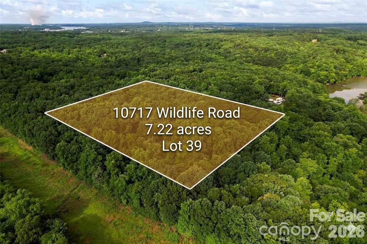 Just reduced by $40K!  Nestled on 7.22 acres of pure privacy featuring your own stream and seasonal water views of Lake Wylie, this wooded lot in amenity-rich The Sanctuary neighborhood is ready for your dream home!  All of the work on this lot has been already done including a FULL survey, a topography survey AND septic perc test (all in the attachments), so you know exactly what you are getting when you make this desirable piece of land yours!  This lot is within walkin distance of "The Camp," which is where all the amenities are housed in this exclusive community!  This on-site managed community offers 7 MILES of Lake Wylie shoreline, 20 MILES of trails, a 17-acre waterfront amenity area featuring 3 swimming pools, 7 tennis courts, fitness center, boating center w/kayaks & canoes, amphitheater, picnic tables, fire pits, boat slip rentals AND a full time activities staff...phew!!  This is an amazing opportunity to buy now & enjoy all this area has to offer and build later as there is NO building timeline!
