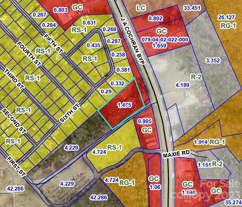 1.48-acre lot located on JA Cochran Bypass (Hwy 72) Great location for any business. GC (General Commercial) zoning allows for a wide variety of uses. Water and Sewer nearby. Don't miss out on this opportunity to invest in valuable commercial real estate.