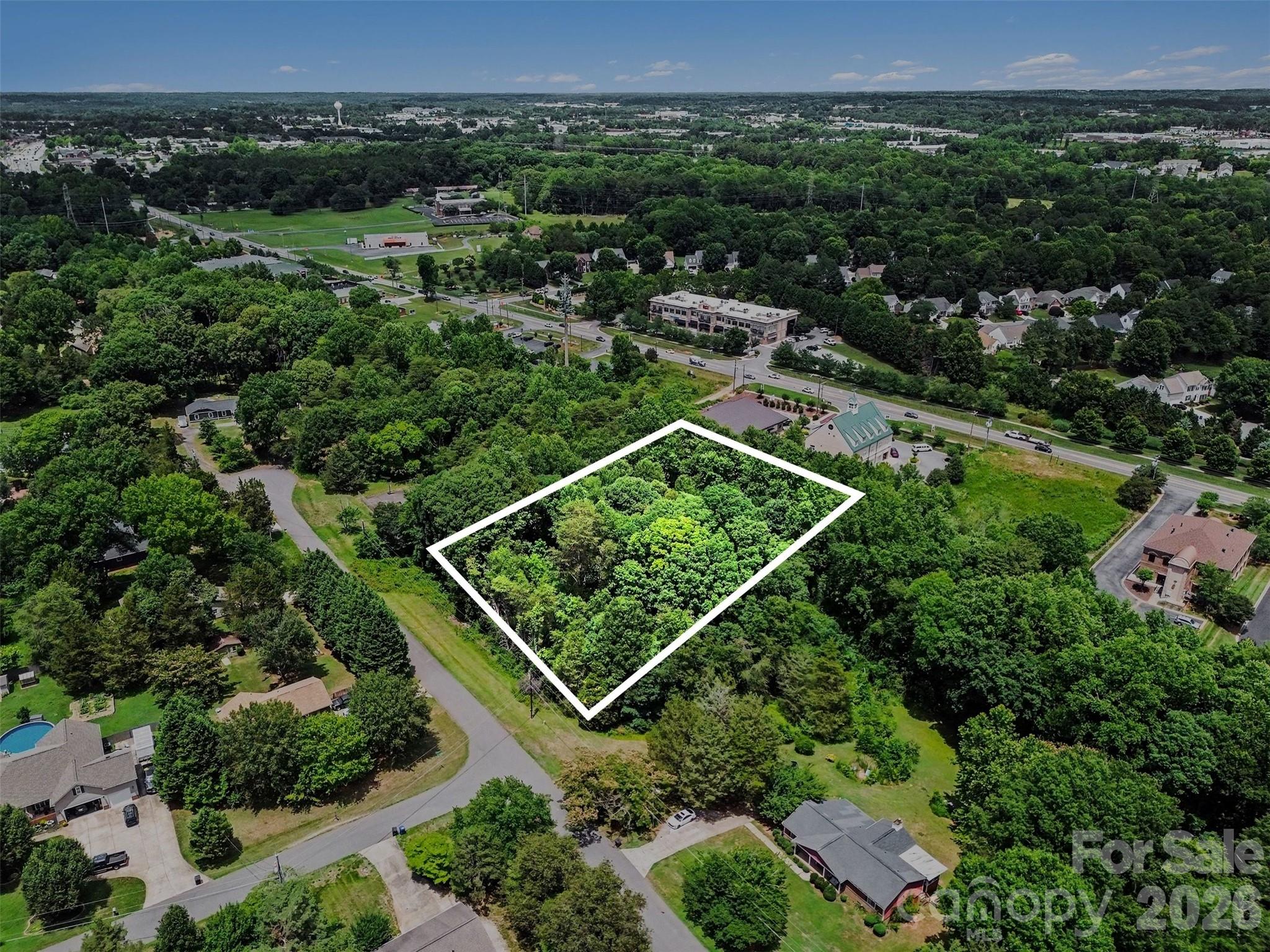 Discover the perfect opportunity to build your dream home on this beautiful 1.38-acre lot (#66) nestled in a peaceful lakefront community.  This property is ready for development and can accommodate a basement foundation. The lot includes valuable documentation such as a survey, soil perc test, and septic system layout—saving you time and upfront costs.

Enjoy the natural charm of the property, which features a small stream. According to the wetland report, the area can be filled and graded, offering added flexibility for your building plans. Report available

Conveniently located just minutes from I-77, shopping, and dining, this property offers both tranquility and accessibility.

A voluntary HOA yearly fee provides access to community amenities, including tennis and basketball courts on Elysian Drive, as well as a pavilion, community dock, and boat ramp located near 596 Williamson Road (see pictures for reference).


The seller is motivated and ready to sell—bring your offer! Buyer’s agents are welcome.