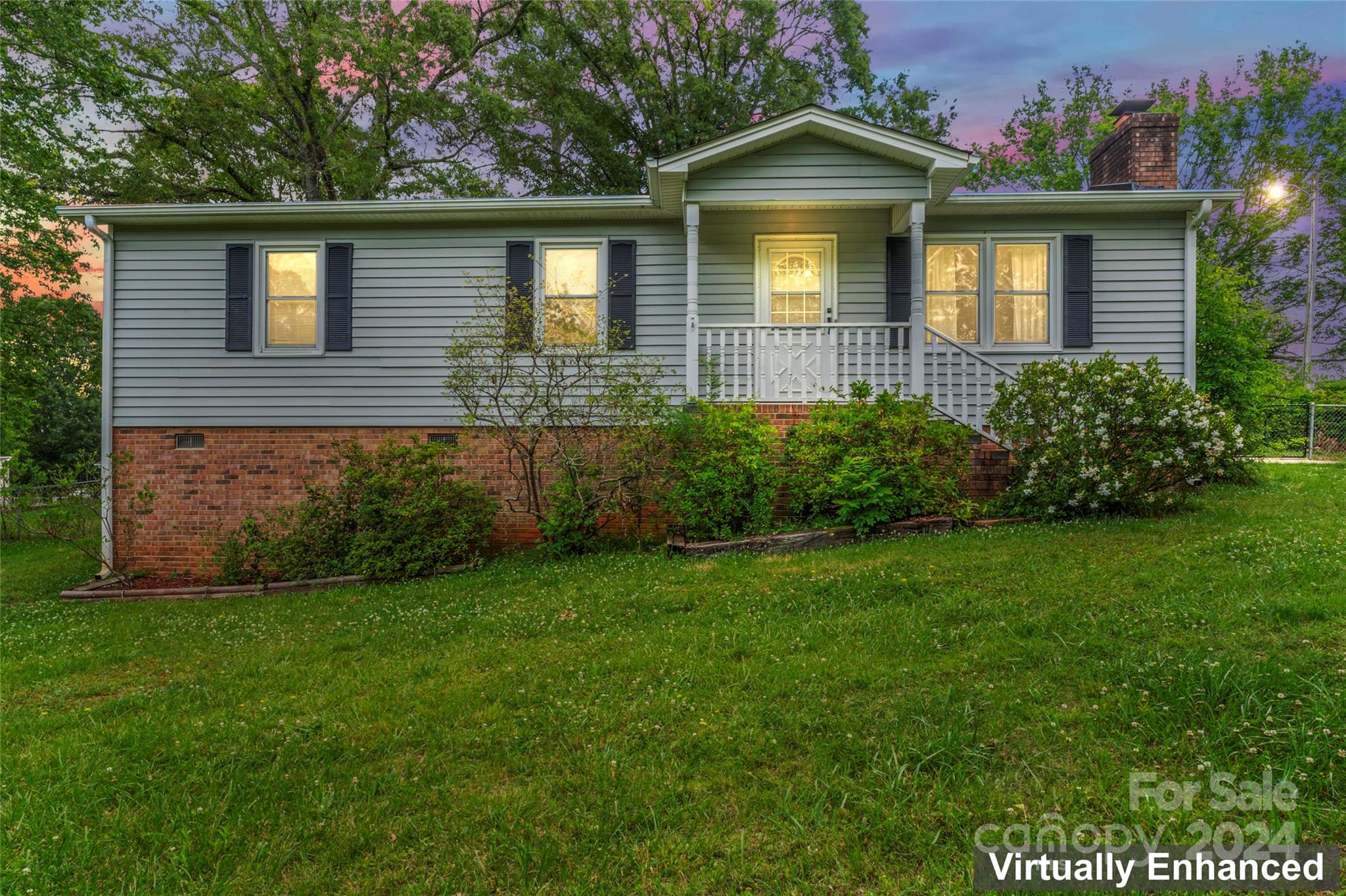 This charming ranch features 3 bedrooms and 1 bath and is absolutely adorable.  At 1332 sf, this home has been impeccably maintained, and just got a brand new roof on both the house and awesome carport/workshop last week!  Featuring hardwood floors, ss appliances, and a new kitchen remodel just a couple of years ago.  On two thirds of an acre, the large private homesite with many flowering trees, garden beds, and a huge fig tree, it is perfect for creating your own backyard oasis.  This is a wonderful opportunity to own a piece of the Rock Hill dream, nestled in a peaceful neighborhood and convenient to shopping, restaurants, great schools, medical facilities, and all the area has to offer.