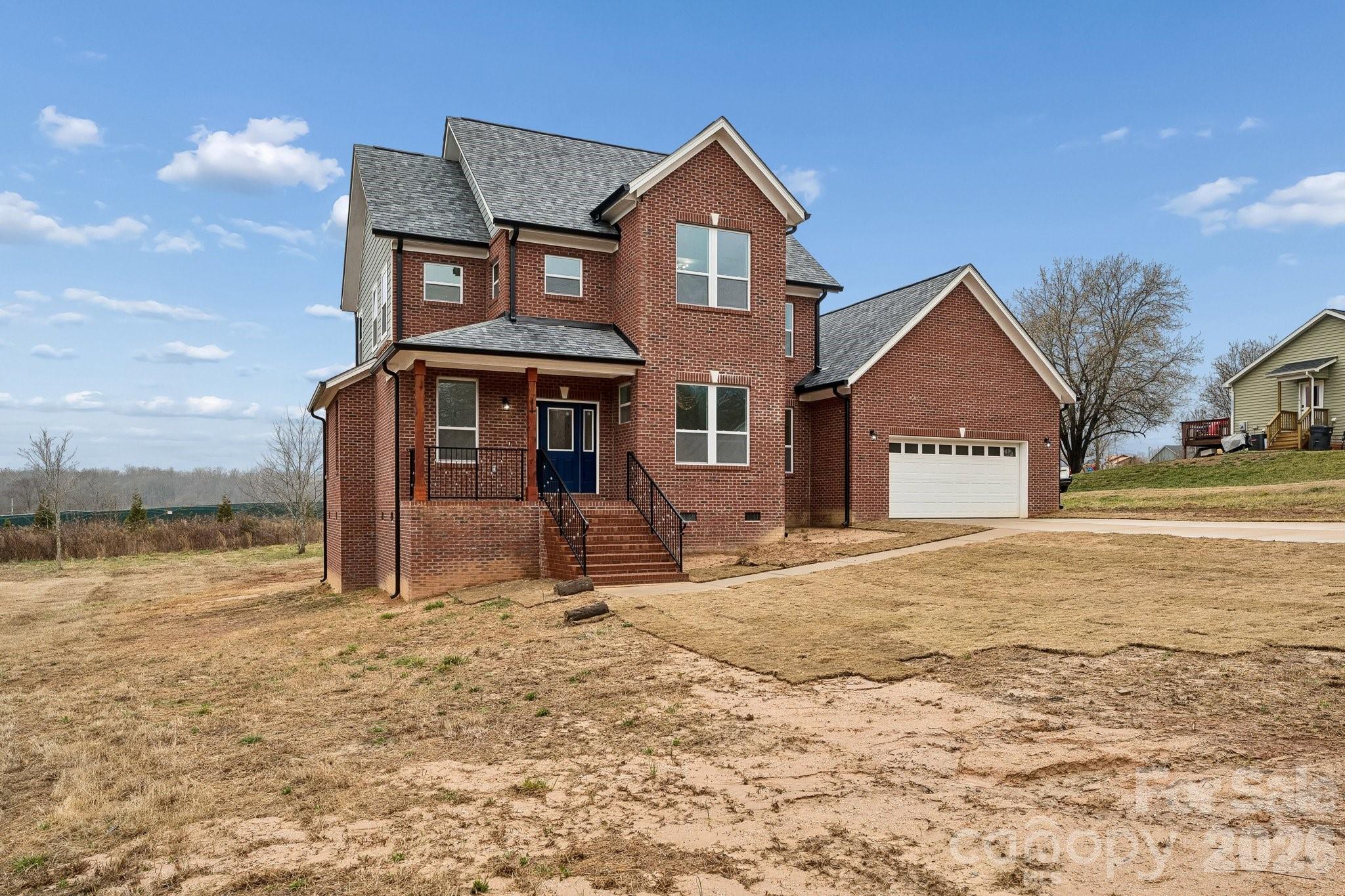 When you want a new build that is different from all of your standard cookie cutter builds - 114 Strawberry Ct will be your dream home!

Completed and Move-in ready, this elegant home blends rural living with modern amenities. A beautiful elevated front cover porch creates a grand entrance and perfect spot for morning brews. A large driveway with deep 2-car garage allows ample parking for your vehicles and RV, boat or UTV's. 3 sides brick at this price-point? You bet it does! .69-acre property line for outdoor living and room for gardening. The outdoor features would not be complete without an oversized rear deck for all of your outdoor furniture, fire pit table and grilling equipment. The exterior is just the invitation, as the interior provides you the luxury that you long for. Gone is the tract build floor plan that everyone has, this home welcomes you from the instant you step inside with a 2- story entry foyer and abundant natural lighting, an office with crystal chandelier and bright natural lighting. Real storage place is available here with a maid's storage room at the front of the home and deep pocket walk in storage under the staircase landing. Enter the living room and natural light continues to greet you with windows across every wall and an open setting from living room, dining and kitchen. The kitchen is like nothing that you have ever seen with extensive counter space, the most counter square footage than anything in the area, an island, custom high end cabinetry and stainless appliances. Is a pantry a must have? Then this home will certainly please you! A true walk in pantry so large that you could create a bedroom out of it sarcastically speaking. Laundry downstairs to avoid any future plumbing repair problems and 3 gorgeous bedrooms up stairs. Primary bedroom features a walk in closet, cathedral high ceilings, windows galore, and an amazing large bathroom with soaking tub. Additional bedrooms are located at the end of the hall and so does the full secondary bathroom which has access from both bedrooms. You deserve value for your investment and a home that is built to last. 114 Strawberry Ct is the home that has been built with high standards.