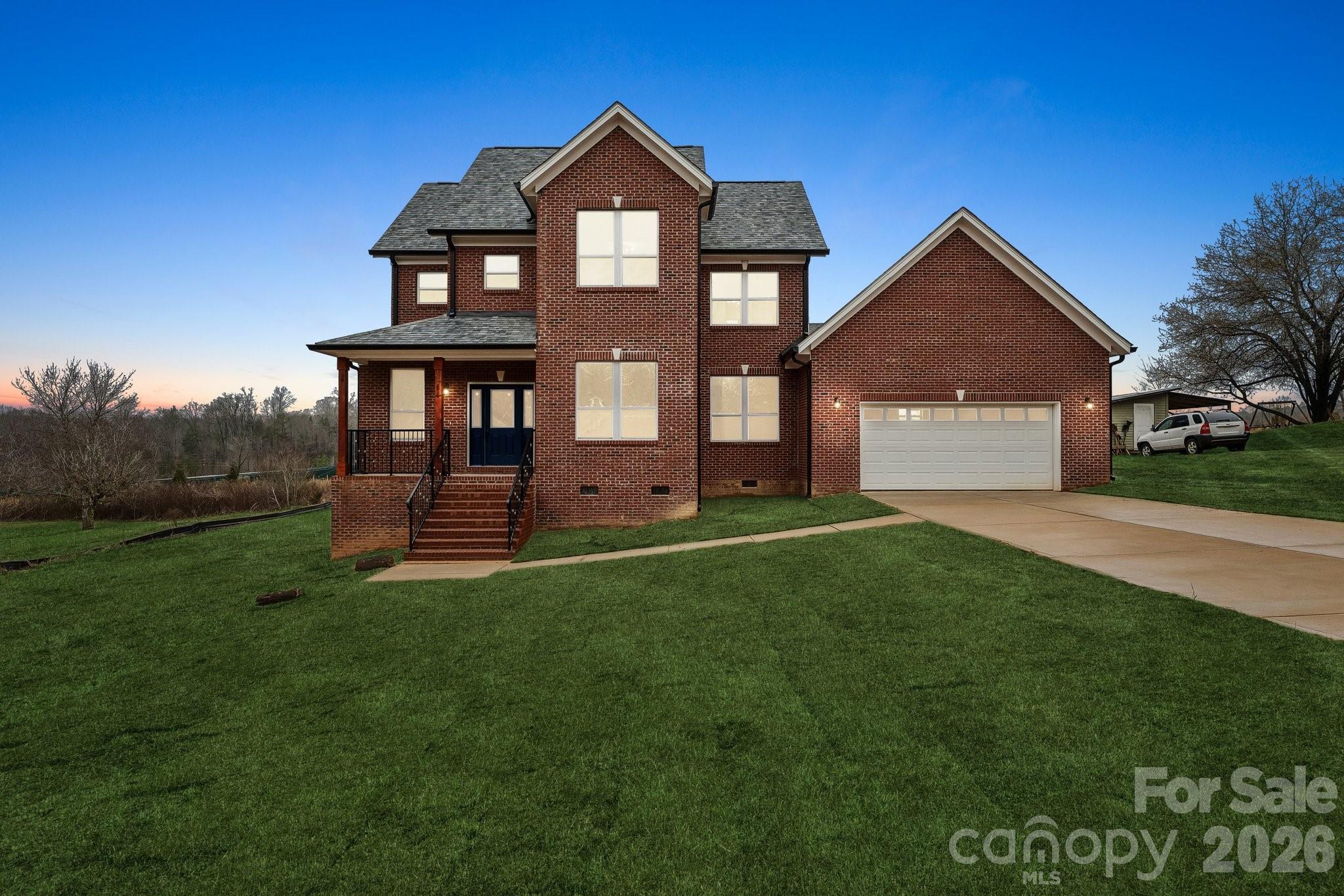 When you want a new build that is different from all of your standard cookie cutter builds - 114 Strawberry Ct will be your dream home!

Completed and Move-in ready, this elegant home blends rural living with modern amenities. A beautiful elevated front cover porch creates a grand entrance and perfect spot for morning brews. A large driveway with deep 2-car garage allows ample parking for your vehicles and RV, boat or UTV's. 3 sides brick at this price-point? You bet it does! .69-acre property line for outdoor living and room for gardening. The outdoor features would not be complete without an oversized rear deck for all of your outdoor furniture, fire pit table and grilling equipment. The exterior is just the invitation, as the interior provides you the luxury that you long for. Gone is the tract build floor plan that everyone has, this home welcomes you from the instant you step inside with a 2- story entry foyer and abundant natural lighting, an office with crystal chandelier and bright natural lighting. Real storage place is available here with a maid's storage room at the front of the home and deep pocket walk in storage under the staircase landing. Enter the living room and natural light continues to greet you with windows across every wall and an open setting from living room, dining and kitchen. The kitchen is like nothing that you have ever seen with extensive counter space, the most counter square footage than anything in the area, an island, custom high end cabinetry and stainless appliances. Is a pantry a must have? Then this home will certainly please you! A true walk in pantry so large that you could create a bedroom out of it sarcastically speaking. Laundry downstairs to avoid any future plumbing repair problems and 3 gorgeous bedrooms up stairs. Primary bedroom features a walk in closet, cathedral high ceilings, windows galore, and an amazing large bathroom with soaking tub. Additional bedrooms are located at the end of the hall and so does the full secondary bathroom which has access from both bedrooms. You deserve value for your investment and a home that is built to last. 114 Strawberry Ct is the home that has been built with high standards.