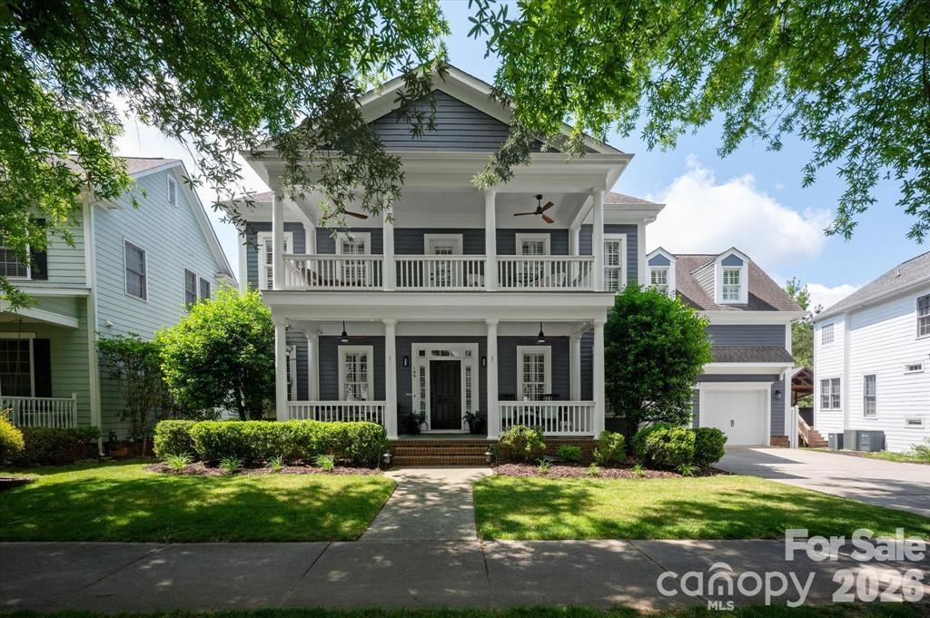 CHARMING home in highly sought after BAXTER VILLAGE! UPDATED kitchen with white cabinets and backsplash, DOUBLE convection oven, stainless steel appliances, granite countertops, and large island for cooking/entertaining. RENOVATED bathrooms with new quartz countertops, new sinks, new faucets, and updated cabinets and flooring. Situated on one of the largest, leveled, fenced, and private yards in Baxter Village with a pergola, fire pit, patio, private access to the community walking trails, AND room for a pool! Family room with a stunning STONE fireplace that adds warmth, texture, and a natural focal point. Double French doors to an extended recreational room. This separate space offers incredible flexibility - it can be used as playroom, additional office, gym, media room, or guest retreat.  Formal dining room, office, and laundry room. Second floor owner's suite with trey ceiling, walk in closet, and RENOVATED bathroom with dual vanities, soaking tub, and separate shower. FOUR secondary bedrooms, one with a private bathroom, RENOVATED Jack and Jill bathroom, and plenty of WALK IN storage complete the second floor! Practically FREE electricity with a 10.7 KWH solar panel system providing 98% of the home's electricity. NEW pipes throughout the home, NEW interior/exterior paint, TANKLESS water heater, refinished HARDWOOD floors throughout the first floor, central vacuum system, DOUBLE front porch, WALKING distance to the community clubhouse, pool, tennis courts, shopping/dining, and Music in the Park.  Southern CHARM, endless AMENITIES, and AWARD WINNING Fort Mill Schools!  Baxter Village has it all!
