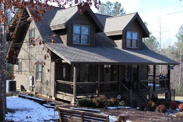SIT AND RELAX on the front porch of this spectacular cabin located in Grandview Peaks! Nestled perfectly on a 1.5 +/- acre mostly level lot, the 2 Br/2Ba cabin offers comfortable living and an open floor plan with lots of natural light. The main level consists of an open great room that includes the kitchen, dining area, living area with fireplace open to the loft, a main level bedroom and full bath, and laundry area. The upper level is the Owner's Suite with large bedroom, full bath.