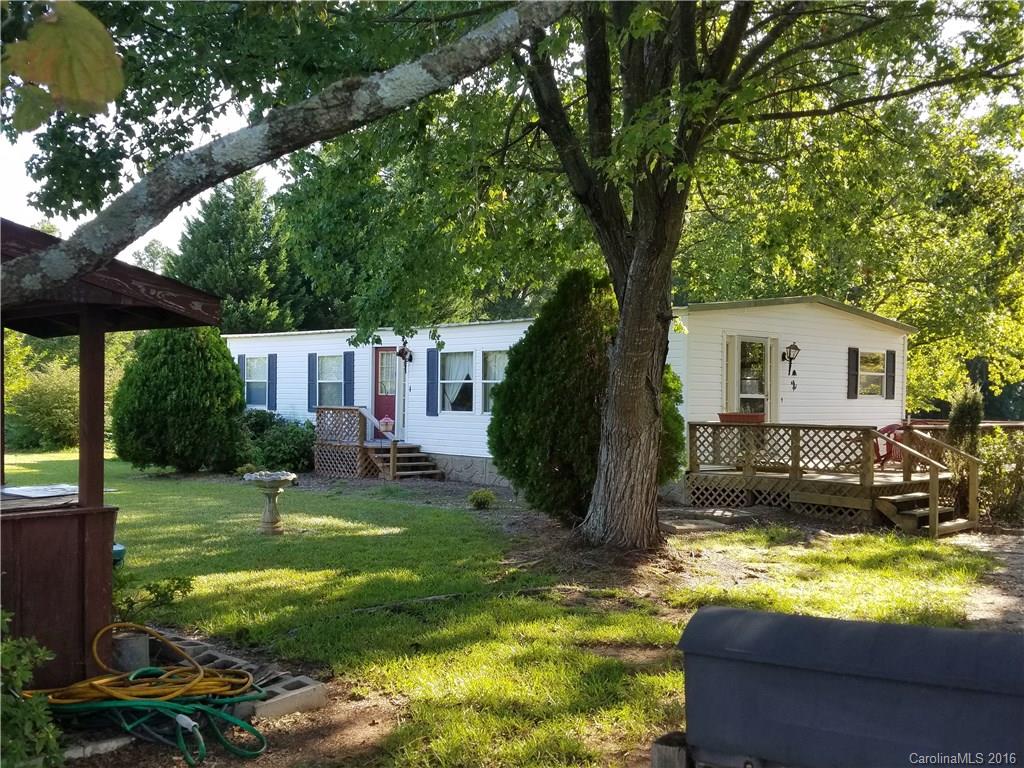 Cute as a button! Located between York Hwy and Old York Rd. across from Carolina Downs Golf Course. Well-maintained 2 bedroom, 1 bath mobile home on large, level lot. Lifetime metal roof, private water and sewer. Storage building with power. Priced to sell!