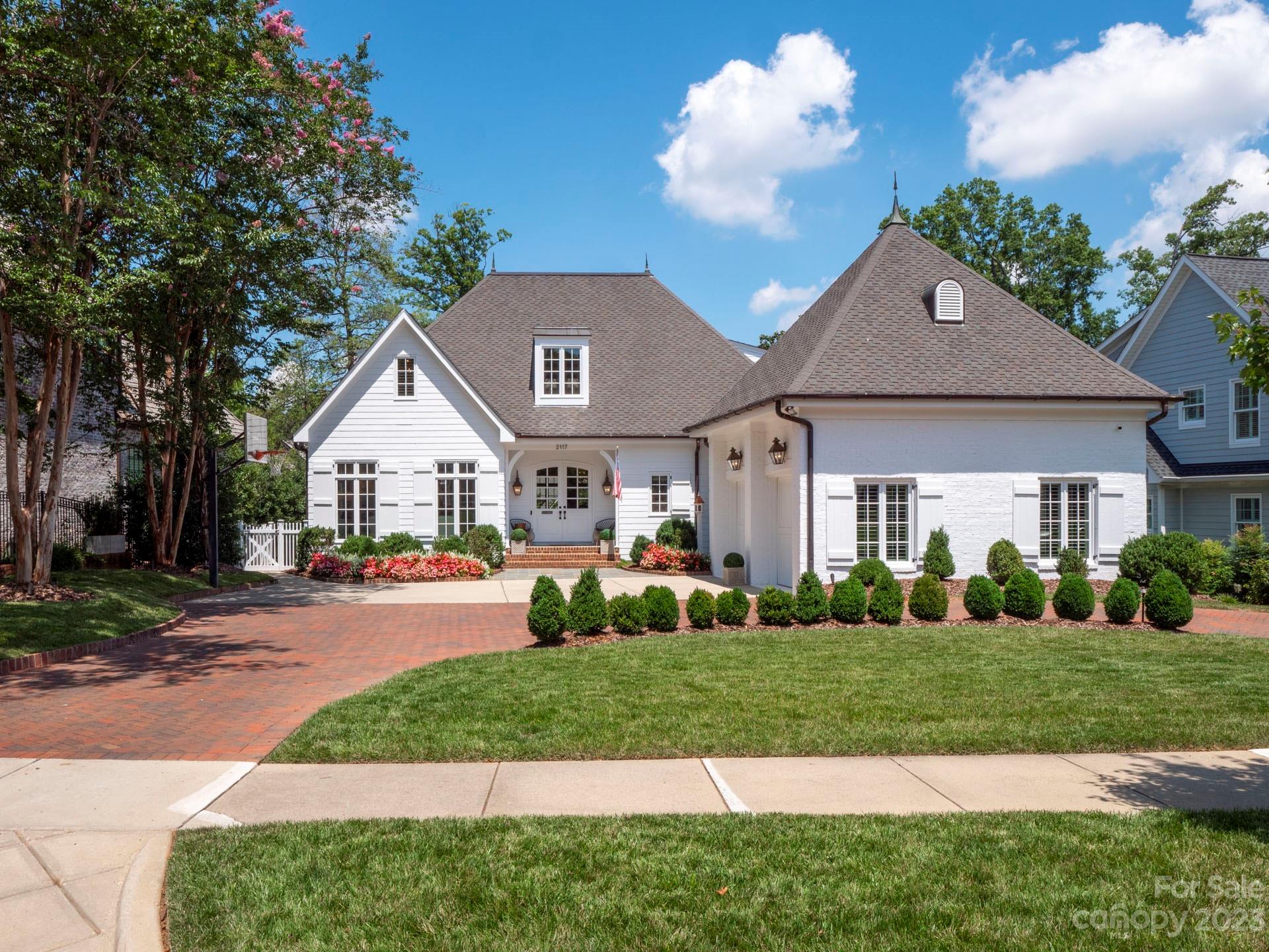 Character and charm await you in this immaculate 5 BR, 4½ BA home located in Myers Park. You will love the layout, location and lifestyle of this fabulous traditional style home built in 2000 to blend with surrounding older homes. Evenings can be spent on the cozy covered back terrace with fireplace overlooking the gorgeous landscaped, fenced yard with sparkling in-ground pool, spa and firepit. The chef will enjoy the large eat-in kitchen with custom cabinetry, under counter lighting, quartz countertops, huge island, gas wolf cooktop, wolf double ovens, two sub zero refrigerators (one in attached garage) and convenient nook/desk area. The open floorplan offers both formal living and dining plus great room with wet bar and access to the terrace. Master suite includes his/her closets and spa like bathroom with double vanities, separate shower and soaking tub. Four bedrooms, two full baths and loft are located on the second level. Bonus room with murphy bed and full bath on lower level.