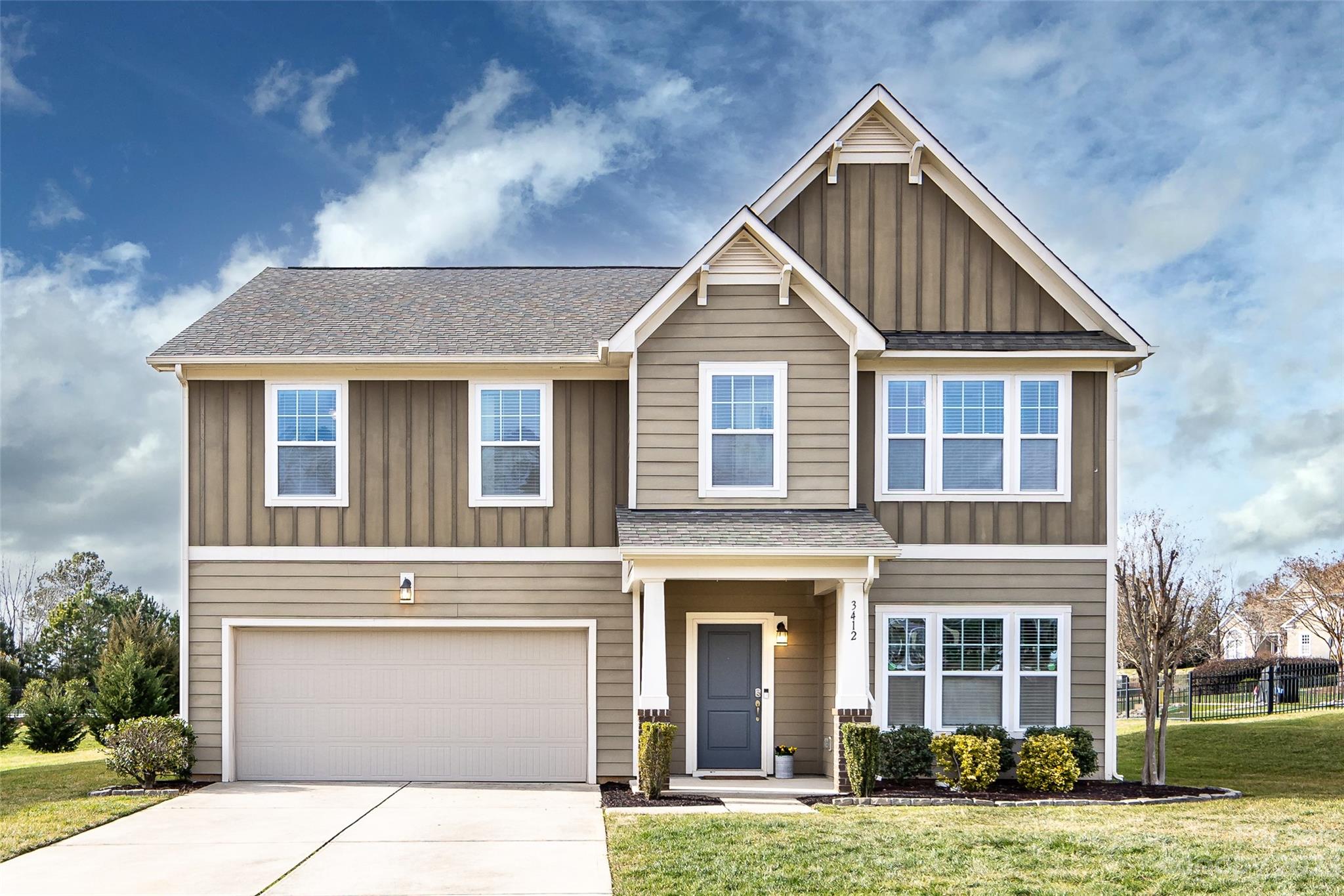 Nestled on a peaceful cul-de-sac in the Fox Ridge community of Indian Land, SC, this spacious home offers an ideal blend of comfort and style. The home has all the space you'll ever need situated on a terrific flat lot.  The open concept design of the first floor creates a welcoming environment for gatherings, complemented by engineered hardwood floors and a well-appointed kitchen boasting generous cabinet space, a walk-in pantry, granite countertops, stainless steel appliances, and an oversized island with seating. Off the kitchen is a spacious drop zone with closet and powder room.  The main level flex space presents versatile opportunities for an office, exercise area, or playroom. A spacious primary suite includes ensuite with generous sized closet. Three additional bedrooms sharing a full hall bath plus a bonus/flex room and huge laundry room are also found upstairs. The home features a board and batten exterior and is located just steps from the community pool and pool house.