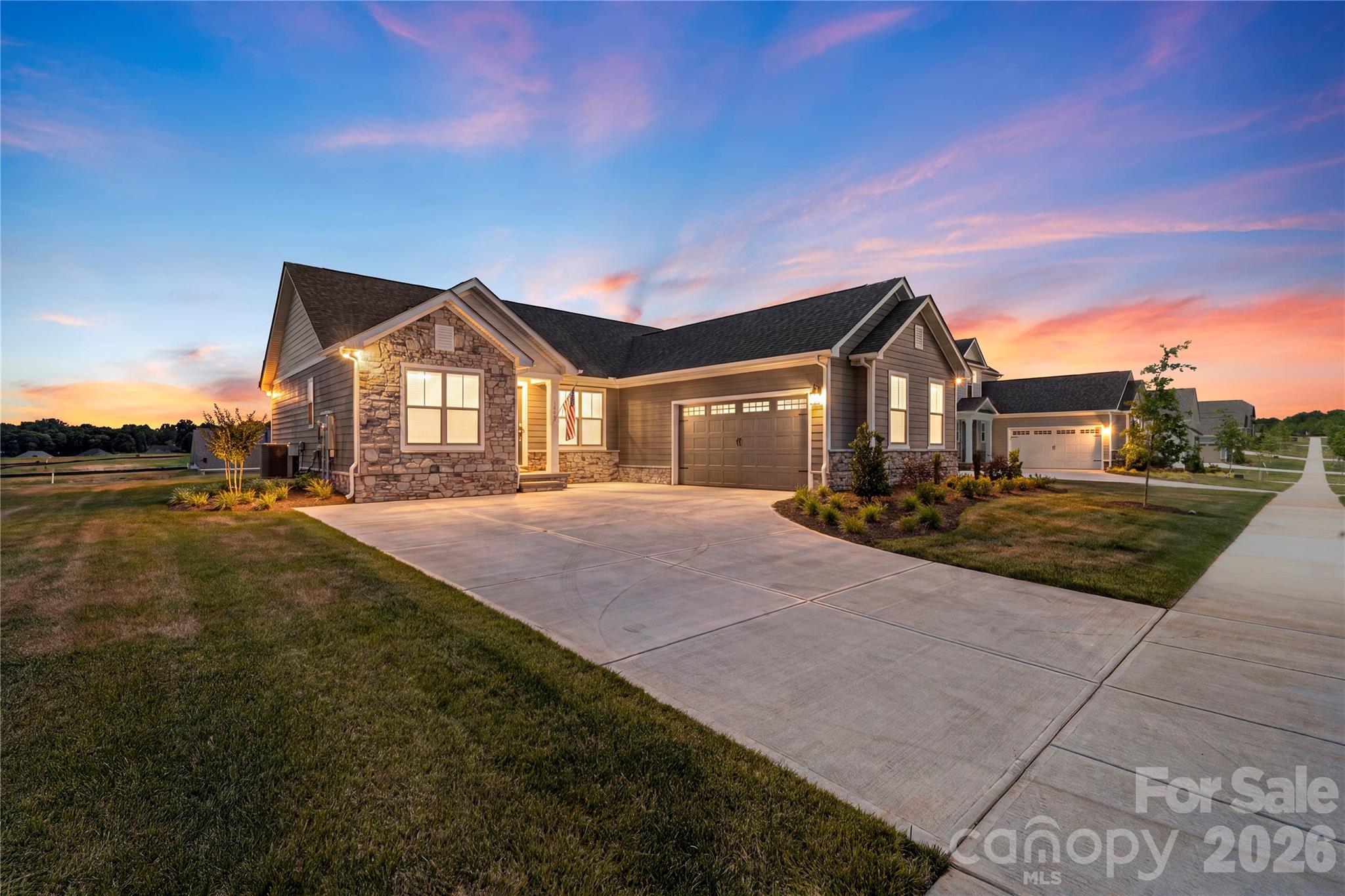 Amazing opportunity to own a better than new home in the up and coming Stoneridge Hills neighborhood – This home was purchased and updated with the intent of a long term ownership however there has been a change of plans and this home is ready for the market! This Ranch home offers 3 bedrooms and 2 bathrooms with an open-concept design and desirable split-bedroom floor plan. Neutral paint and durable luxury vinyl plank flooring flows throughout the entire home creating a stylish and low-maintenance living environment. The spacious living room boasting tray ceilings seamlessly connects to the dining area and gourmet kitchen featuring a large island with breakfast seating, walk-in pantry, gas cooktop, wall oven, Energy Star appliances, custom tile backsplash, roll-out shelving, and abundant storage. The private primary suite offers a walk-in closet with custom closet systems and ensuite bath highlighted by a stunning tile surround shower. The two secondary bedrooms are both generously sized and provide additional living area or can make a great flex space if an office or hobby room is needed! Enjoy outdoor living from the covered front porch and covered rear porch overlooking the large rear yard. Additional highlights include a tankless water heater, in-ground irrigation system, fiber optic internet availability, epoxy-coated garage flooring and stem wall, and a 2-car side-entry garage. Located in a community with recreation areas, ponds, sport courts, street lights and upcoming dog park this home will have something for everyone!