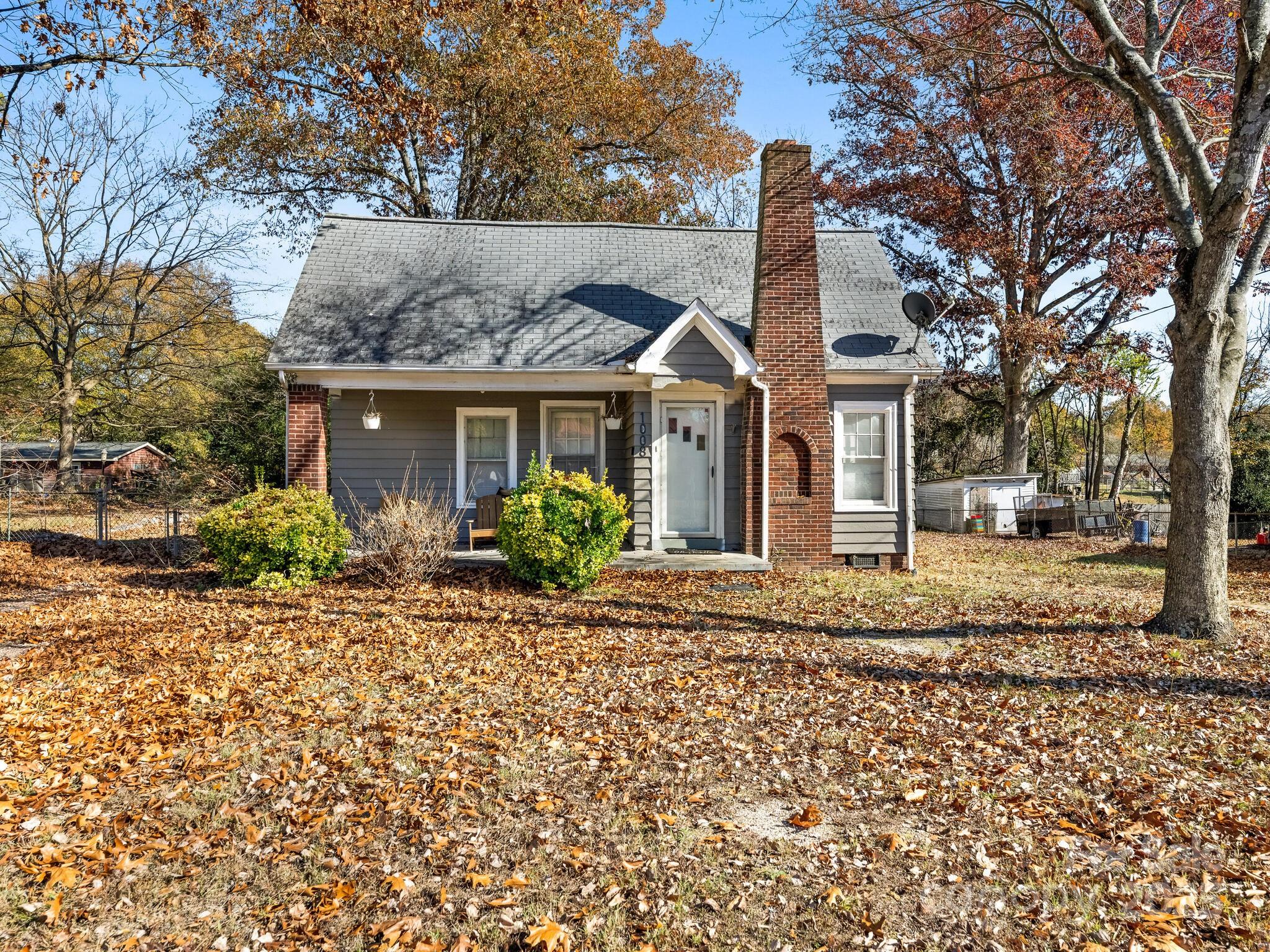 Beautiful bungalow provides comfortable living in an established community.  This home offers the ease of single-story living with many updates and areas where you can bring your own design style and finishing touches. Hardwood floors flow throughout to add a touch of elegance everywhere. Versatile flex space in back—perfect for home office, playroom and convenient laundry. Your favorite cook will enjoy the easy clean stainless appliances, ample storage and barstool counter - perfect for a quick snack or casual meals. Window at kitchen sink offers views of your large yard with plenty of room for outdoor fun. Central air and natural gas heating provides energy-efficient comfort throughout the year. Forget cramped city lots! This almost 4/10 acre level property is partially fenced and equally fun for gardening, gatherings, ballgames & big dogs. Charming stone walled patio and fire pit are perfect for cool Carolina evenings with friends and family. Detached oversized garage provides options for parking, storage or workshop space for hobbyists and projects. Located just minutes from Downtown Kannapolis, NC Research Campus, Gem Theatre, and a steadily expanding collection of local restaurants, breweries & entertainment perfectly positions you to enjoy the best of Kannapolis. Excellent schools, several parks and just about any service you could want are all located within a few miles. Easy access to main roads makes for convenient travel throughout the Charlotte metro. Or just stay a while and enjoy this friendly Archer Park neighborhood in your front porch Adirondacks! This home and location have so much to offer; see it for yourself today!
