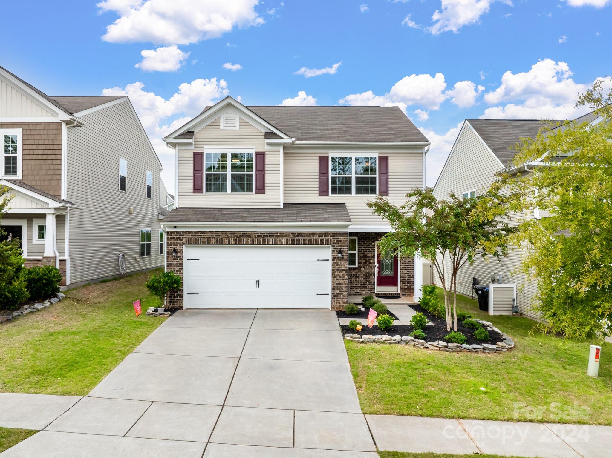 Welcome to this stunning two-story home featuring a spacious and modern layout. The main level boasts stylish LVP flooring throughout, a cozy living room with a fireplace, and a dining area perfect for entertaining. The kitchen is a chef's dream, equipped with stainless steel appliances and elegant granite countertops, making meal prep a delight. A convenient half-bathroom completes this level. Upstairs, you'll find a versatile loft area along with three comfortable bedrooms, each featuring ceiling fans for added comfort. The laundry room is conveniently located on the second floor. Step outside to discover a large backyard, perfect for outdoor activities and relaxation. With a two-car garage providing ample storage and parking, this home is a must-see! Plus, enjoy the community amenities, including 2 brand-new pools, walking trails, ponds, and playground areas. **Seller to provide $2,500 toward buydown or closing cost.** **BACK ON THE MARKET AT NO FAULT OF THE SELLER****