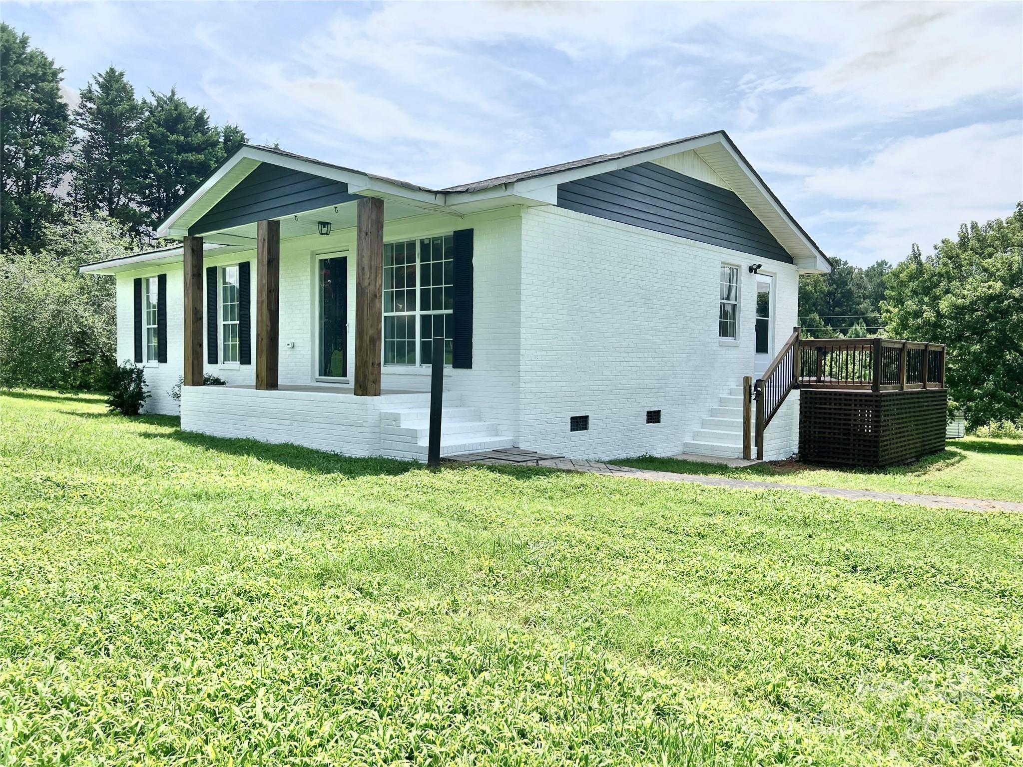 Welcome to this wonderful brick country ranch home on 1.98 acres! This home was built in 2002 and is tucked away just outside of the Lowrys community. Enjoy low Chester County property taxes! Fiber internet ready. Bring the horses, chickens, goats, and four wheelers! There is a large fenced in pasture area out back. The home has been freshly updated with new granite countertops in the kitchen and bathroom. New tile backsplash in the kitchen. New electric range and overhead microwave for your cooking needs. The Laundry Room is located in the hallway. There are three storage units on the property.