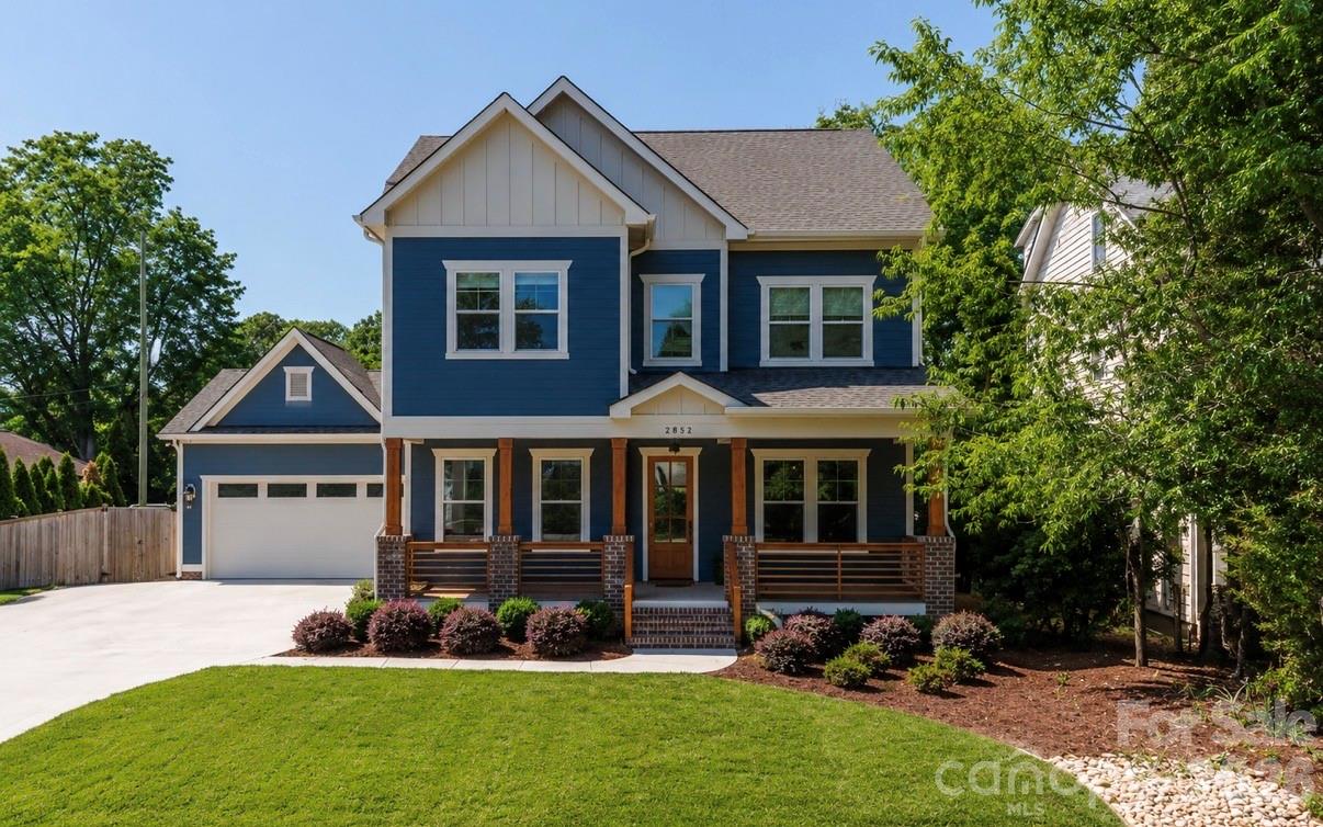 Perfectly situated in the heart of Charlotte, just minutes from Dilworth, South End, SouthPark, Uptown, and Freedom Park. Enjoy front porch living on a quiet street in the heart of Sedgefield, one of Charlotte’s most desirable neighborhoods. Built in 2022, this beautifully maintained home feels like new construction. Inside, a bright French door study and a formal dining room welcome you, flowing seamlessly into the open great room and a well-appointed kitchen with a butler pantry/workstation. Perfect for entertaining or everyday living. Hardwood floors extend throughout the entire home, and the spacious primary suite offers a luxurious retreat with a soaking tub, larger than life shower, and a large walk-in closet. The third floor features a 985 sq. ft. bonus room for recreation, work, or play. Step outside on to the back covered porch to an over-sized flat .46 acre fenced yard with irrigation in place, ready for outdoor living, gardening, or gathering with friends and family. Enjoy the peekaboo city view on the back porch.  With the generous space behind the fence, there's a potential to install a pickleball court or outdoor amenities.  This home also features an EV charger in the garage and a long extra-wide driveway.