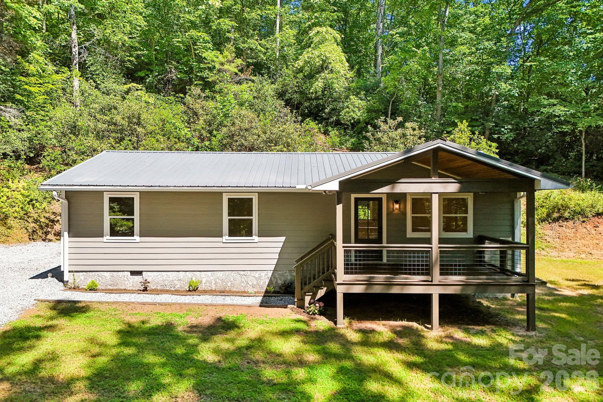 Charming, Fully Remodeled Mountain Retreat on 1 Private Acre!Located at the quiet end of a peaceful cul-de-sac, this completely transformed 3-bedroom, 1-bathroom home offers stylish finishes and serene country living. Situated on a beautiful, usable 1-acre lot, the property boasts a park-like setting featuring a perfect mix of mature woods and lush green grass.Step inside to find a bright, open floor plan where nearly everything is brand new. Rest easy knowing the home features a brand-new roof and a brand-new HVAC system for year-round comfort and worry-free living. Every corner has been updated with contemporary fixtures and fresh paint throughout.Enjoy ultimate privacy with room to garden or play, all while staying exceptionally convenient to downtown Brevard, NC, local dining, and world-class hiking. Move right in and start enjoying the quiet mountain lifestyle today!