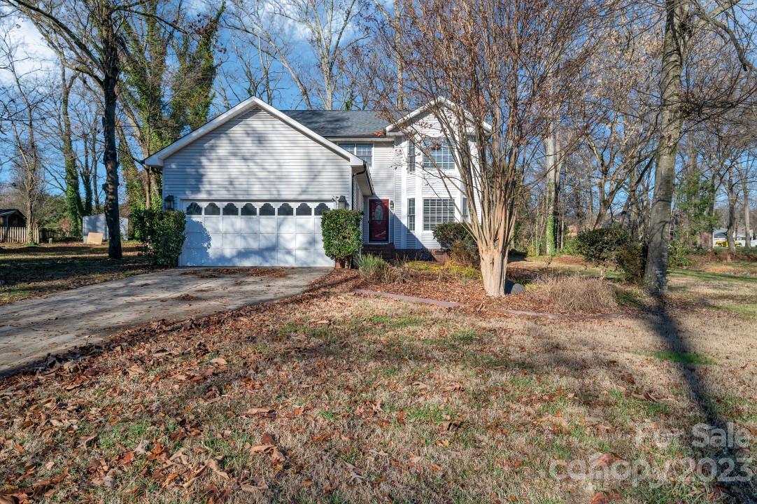 This 3 Bed, 2.5 Bath,1823 Sq Ft gem is a testament to elegance and functionality. As you enter, you are greeted by the enchanting wood floors that flow seamlessly through the foyer, kitchen, breakfast nook, and laundry area, setting the tone for the entire residence. Whether it's a casual breakfast or a formal dinner party, the dining spaces in this home are designed for both style and practicality. The kitchen, boasts granite counters, a tasteful tile backsplash, and upgraded cabinets. Escape to the tranquility of the bedrooms, each thoughtfully crafted to provide a retreat within your own home. Comfort meets style in every corner, ensuring a peaceful night's sleep. Situated in the heart of Concord, NC, this residence offers not only a beautiful home but also a prime location.