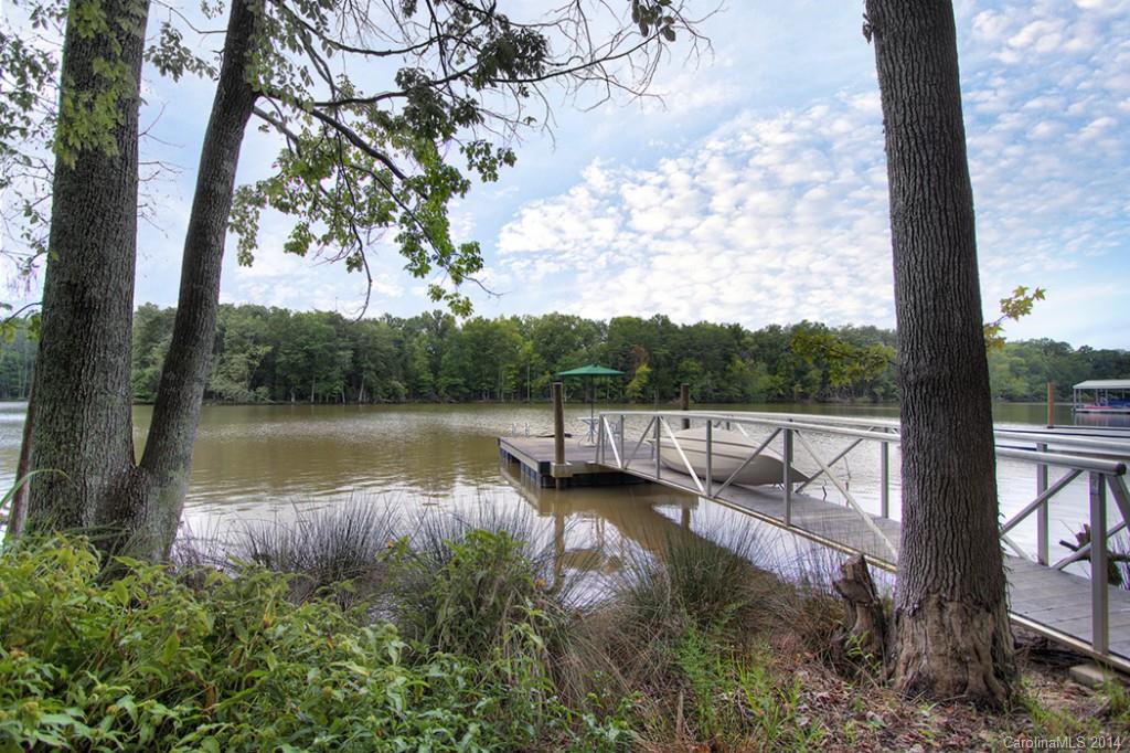 Enjoy life on the water in this Fuzzy Zoeller Lifestyle Community featuring a championship golf course, 3500 acre lake, and great lakeside recreational area with other amenities planned. Easy 45 minute drive to either Charlotte or Columbia.  This single story home has great views of the water from screened porch and the deck. Bring your boat because the dock is already in place.  Inside you'll find a smart floor plan with great features including granite counter tops and stainless appliances.
