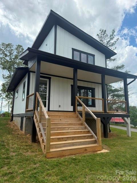 Modern mountain living meets clean, timeless design in this brand new 3 bedroom 2.5 bath home just minutes from downtown Asheville. Nestled in the heart of Buncombe County- know for its scenic Blue Ridge setting and strong demand for residential homes, this home offers the perfect balance of style, function, and location. Step inside to an open, light filled layout featuring wide plank hardwood floors, neutral tones, and a sleek modern staircase with wood treads and metal balusters. The kitchen showcases contemporary cabinetry, solid surface countertops, stainless appliances, flowing seamlessly into the main living space-ideal for entertaining.Upstairs, 2 spacious bedrooms with jack and Jill bathroom including black ceiling fans in each room.Large and very bright laundry room on second floor. Enjoy outdoor living on the covered front porch  with wood accents and cable railing-perfect for relaxing and welcoming guests. The elevated design enhances curb appeal and provides a modern farmhouse feel.
Whether you are looking for a primary residence, second home, or investment opportunity, this move-in ready new construction checks all the boxes!