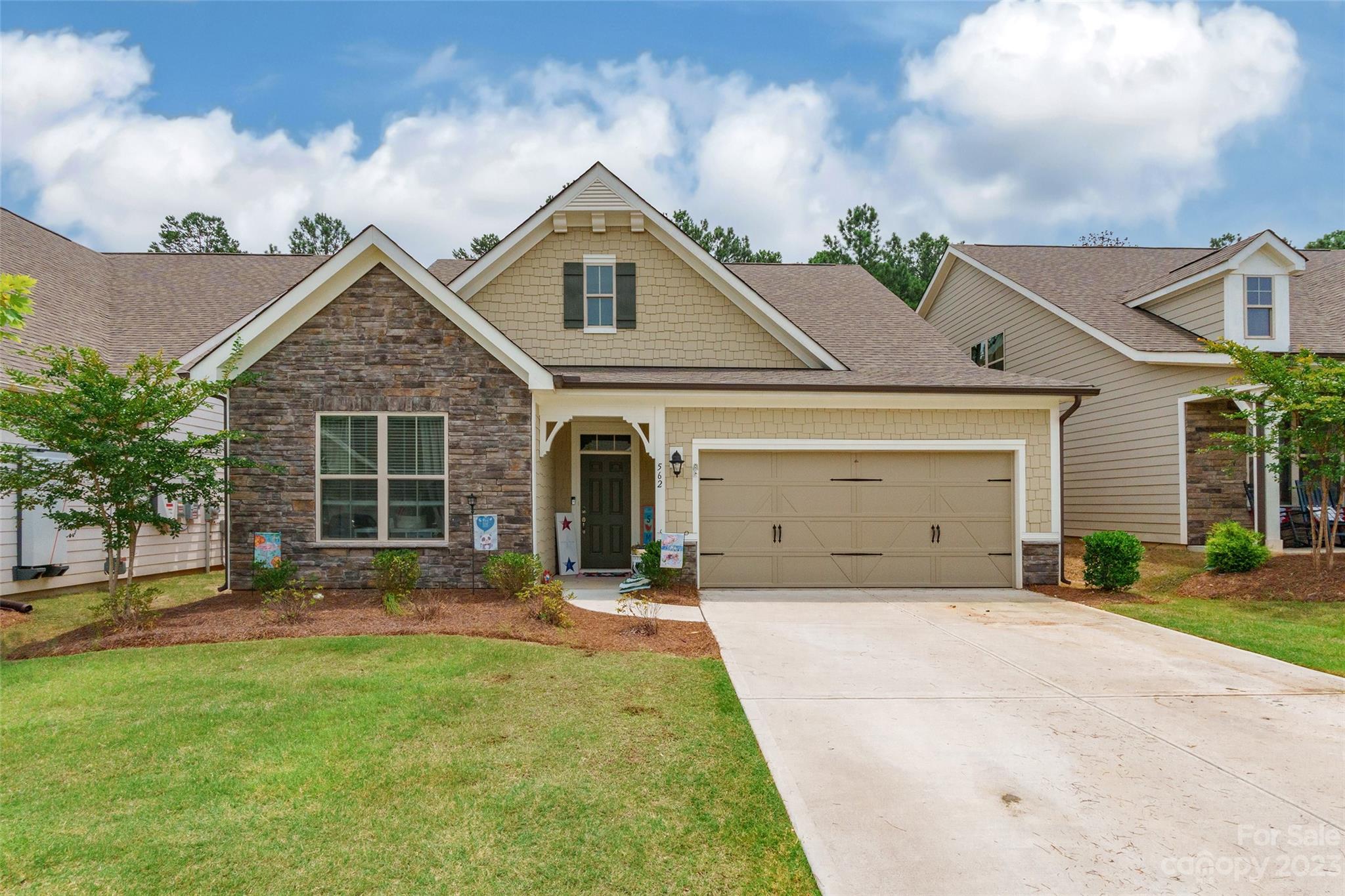 Great open floorplan with all bedrooms and bathrooms on main floor with additional bonus bed/bath/loft on the upper floor. Vaulted living area with gas log fireplace. The granite kitchen boasts abundant cabinets, stainless appliances and opens to dining area. Primary suite offers a large walk in tile shower with dual vanity. Lawncare is included for maintenance-free living. Rhyne Estates is conveniently located near shopping, dining and main roads. +More photos coming soon.