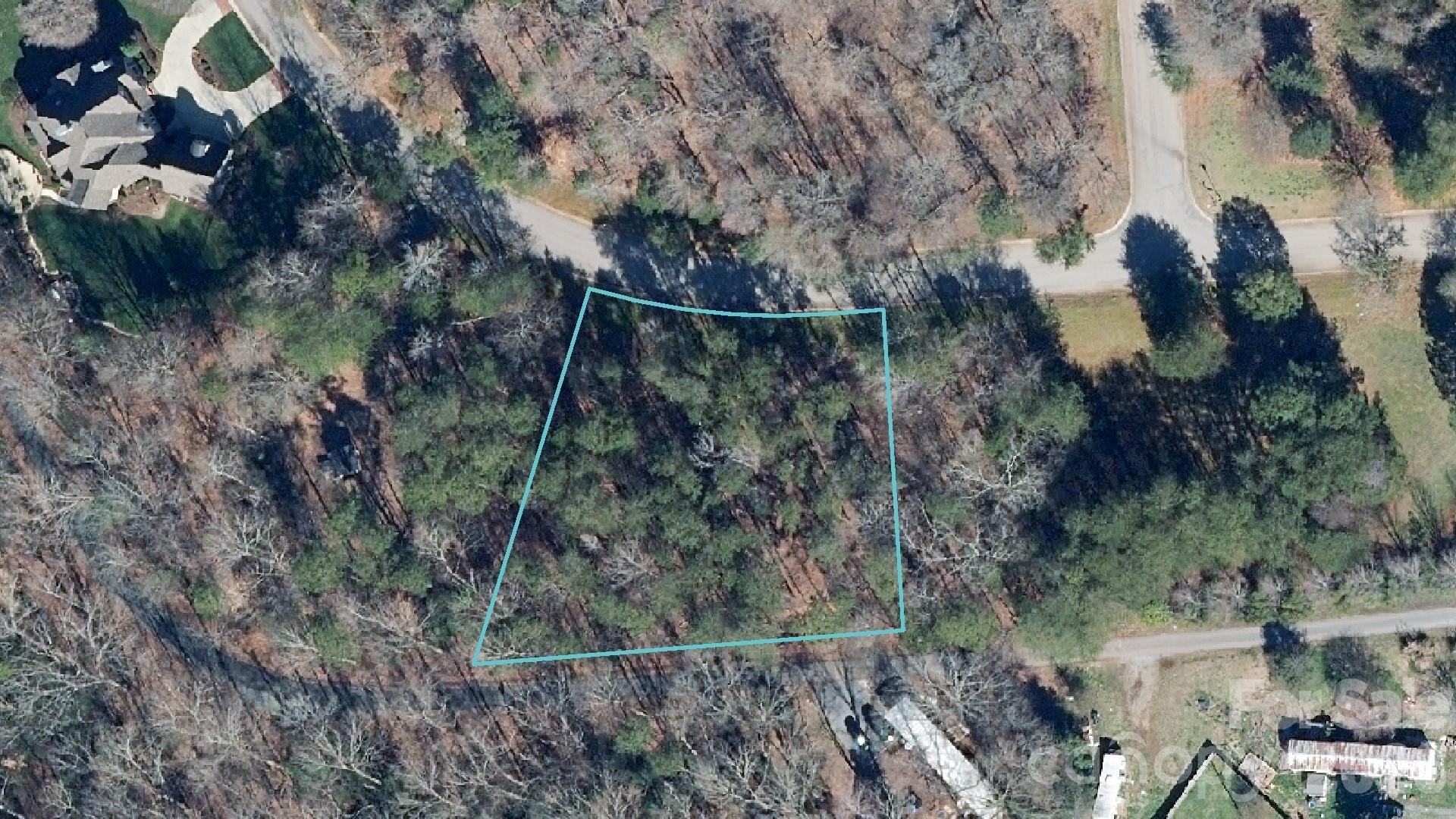 Build your custom luxury home on this .65-acre level lot located within the prestigious gated community of River Lakes. Offering a rare blend of privacy and accessibility, this homesite is situated just a 10-minute drive from the vibrant atmosphere of Downtown Belmont, where you can enjoy local breweries, boutique retail, and acclaimed restaurants. For those commuting or seeking city amenities, Uptown Charlotte is a convenient 30-minute drive away, providing the ideal balance between a quiet small-town feel and metropolitan proximity. The minimum build requirements for a one-story home on a crawl foundation are 2,800 square feet (HLA), while a two-story residence requires 3,400 square feet (HLA). While all custom home plans must undergo a formal review process to ensure community harmony, there is no initial build time requirement, allowing you to purchase the land now and build whenever you are ready. The lot has already passed a perk test for a four-bedroom home, and interested buyers are encouraged to contact the county to explore the potential for additional bedrooms.
