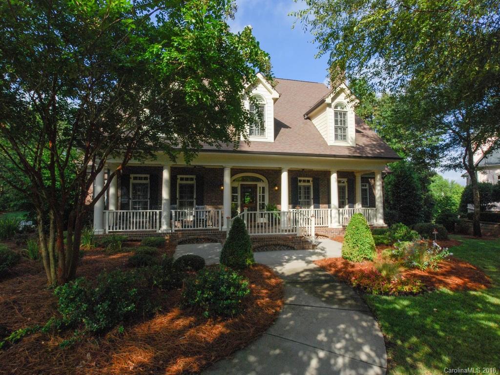 Own a piece of Fort Mill's History with the beautiful "Hart Estate" in Springfield.Truly a home that stands out from all others & a compliment to SC Historical Architecture. You will love everything about this prime location on a Wooded and Private parcel on the 9th Fairway; Cul-de-sac; & approx.1 ACRE LOT. Sip on your favorite drink while relaxing on one of the many outdoor living spaces overlooking the property.This home truly has all that you expect in a new home with your desire for "Charm".