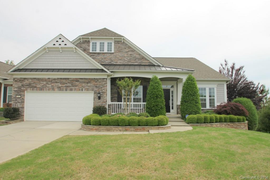 Stunning Morningside Lane in Sun City Features 4 BD/4.5BA, Office, Sunroom, & Full Finished Basement with wet bar! Gorgeous deck/patio overlooks private wooded lot with water and golf course view. Hardwoods, gourmet kitchen w/ granite, stainless, and much, much more!  This is a “MUST SEE” home! Great location on Private Street! Pristine Condition!