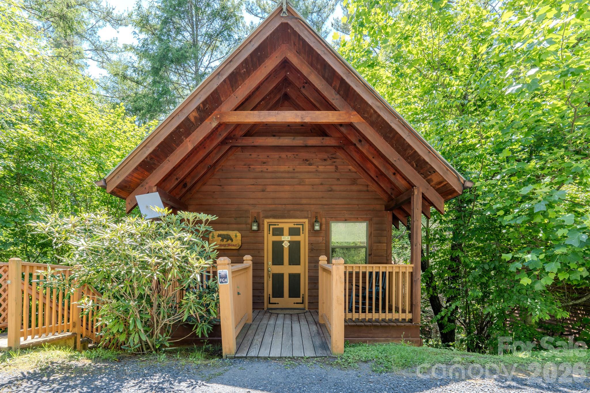 Rare opportunity to own 5 lots totaling 6.013 acres in the Bear Den Campground community just off the Blue Ridge Parkway. This fully furnished mountain cabin features soaring vaulted ceilings, exposed timber beams, warm wood finishes, a full kitchen, spacious bathroom, and a covered porch overlooking a peaceful wooded setting. Surrounded by nature, the property offers an exceptional combination of privacy, mountain charm, and acreage rarely found in the community.
Enjoy convenient access to the Blue Ridge Parkway, hiking trails, waterfalls, scenic overlooks, and countless outdoor recreation opportunities throughout Western North Carolina. Whether you're looking for a personal mountain retreat, seasonal getaway, or vacation rental opportunity, this property offers a unique chance to own your own slice of the Blue Ridge Mountains.