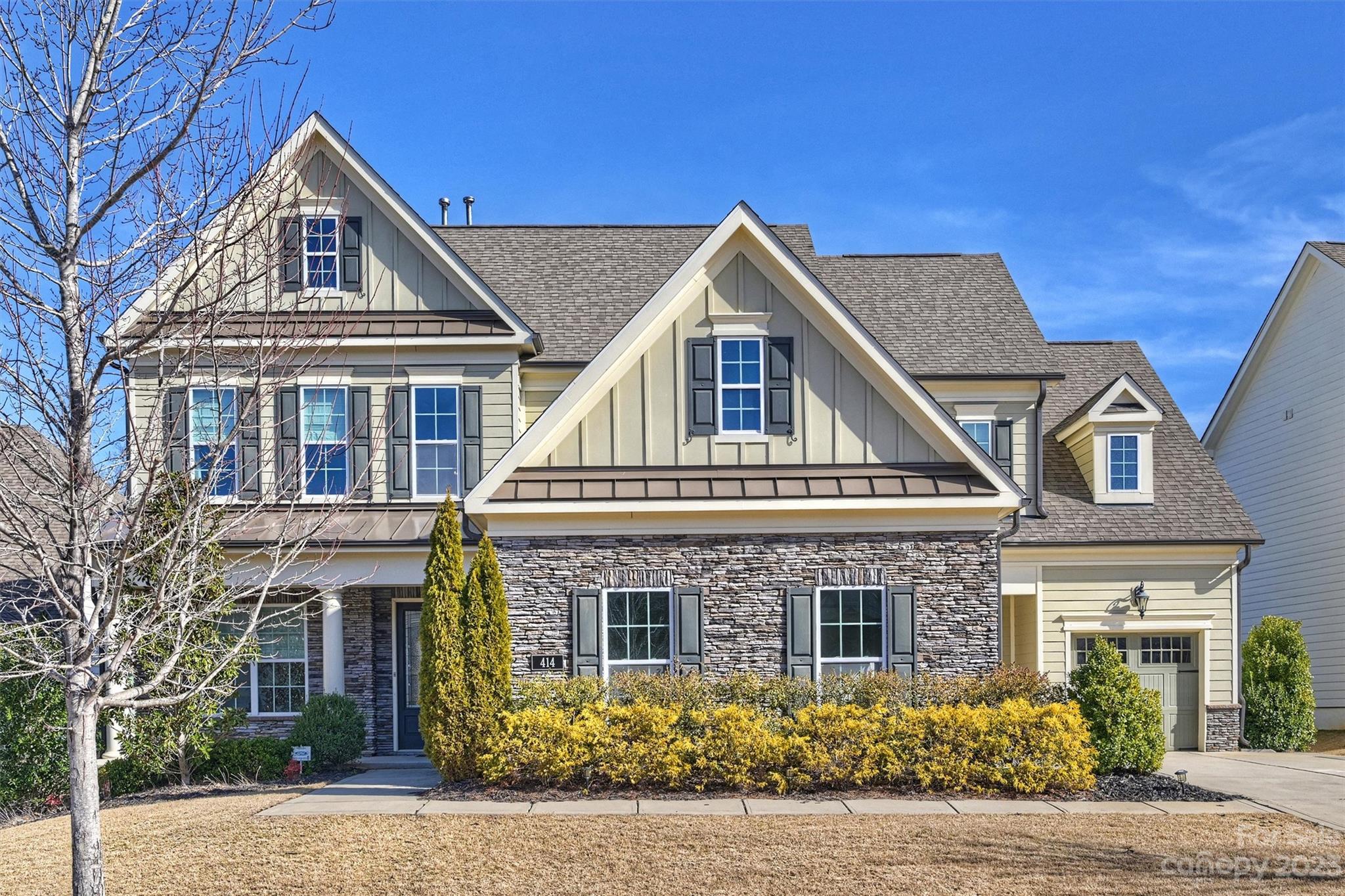 Stunning home in highly sought-after Springfield community. Located on a quiet cul-de-sac, this home has excellent curb appeal! Elegant 2-story foyer opens to gorgeous study w/decorative molding & French doors. Spacious great room features stone fireplace with/gas logs and flows into dining area & kitchen – wonderful open plan! Dream kitchen has gorgeous custom cabinets, large island, designer backsplash, SS appliances & granite countertops. Office has French doors & coffered ceiling – could be used as playroom or private den. Other main floor features include walk-in pantry, drop zone w/computer niche, 10’ ceilings and 8’ doors. Upstairs primary suite offers tons of natural light, decorative molding, huge closet & FABULOUS bath w/dual vanities, W/I tiled shower & soaking tub. Secondary BRs are spacious, and bonus offers more great living space. Other special features: incredible screened porch with stone fireplace, 2-car & 1-car attached garages, and TONS of storage space!