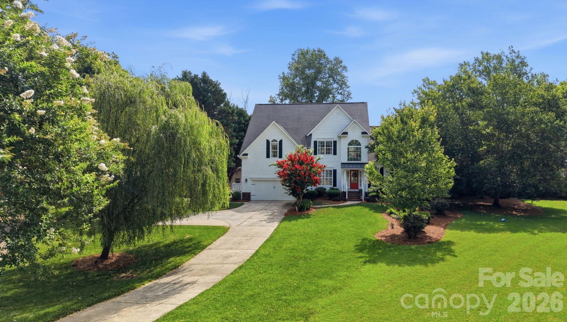 Nestled on a private cul-de-sac lot of more than half an acre in desirable Rougemont, this beautifully maintained home offers a rare combination of privacy, outdoor living, and everyday comfort.

The thoughtfully designed floor plan features a sought-after main-level primary suite, 4 bedrooms, 2.5 baths, and beautiful Brazilian cherry hardwood flooring throughout much of the main level. Generous living spaces and abundant natural light make this home ideal for both entertaining and daily living.

Outdoor living truly sets this property apart. Enjoy a spectacular vaulted screened porch overlooking the private, fenced backyard, heated in-ground pool, mature landscaping, and wooded views. A charming pool house/she-shed provides additional flexibility for hobbies, storage, or a private retreat.

Recent improvements include HVAC and heat pump replacement in 2024 and water heater replacement in 2025.

A rare Ballantyne opportunity combining a premier location, exceptional privacy, and resort-style outdoor living.