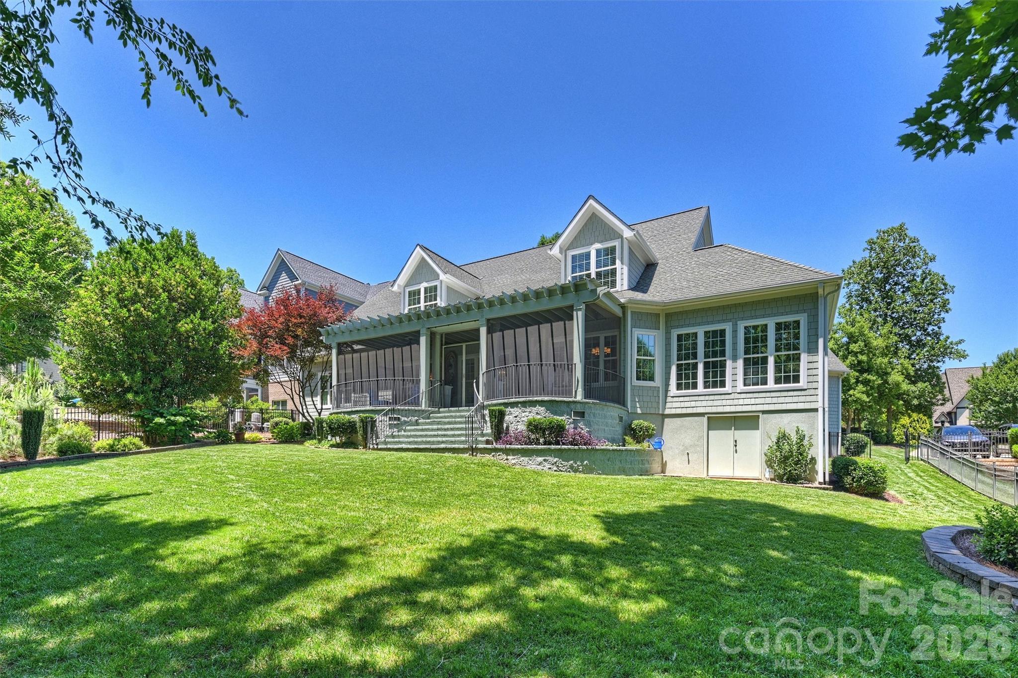 Welcome Home to this Charming Southern Beauty.  This Custom Built , Original Owner and Meticulously cared for , 4 Bedroom 4.5 Bath Home sits on a .46 acre lot backing to trees and the 18th hole of Springfield Golf Course.   Luxury Living in highly sought after Springfield Community of Fort Mill, SC.  
The Main Floor Features a Dining Room, Private Office, Primary Bedroom & Bathroom, Large Family Room that leads into the Gorgeous Open Kitchen, Breakfast Area and Sunroom.  Upstairs offers 3 Additional Bedrooms with their own Full Bathroom and 682 Sq Feet of Unfinished Bonus Space that can be easily finished for your needs.
The Backyard Features a Gorgeous Screened in Back Porch Overlooking a Stunning Manicured Yard and views of the Springfield Golf Course.  As well as your very own Conditioned Walk In Workshop/Storage Room to use for yard tools, crafts, or holiday items... the options are endless in this custom beauty.  
Springfield Community offers Outdoor Pool, Clubhouse, Walking Trails, Tennis Courts, Pickle ball Courts, Playgrounds and Recreational Areas.