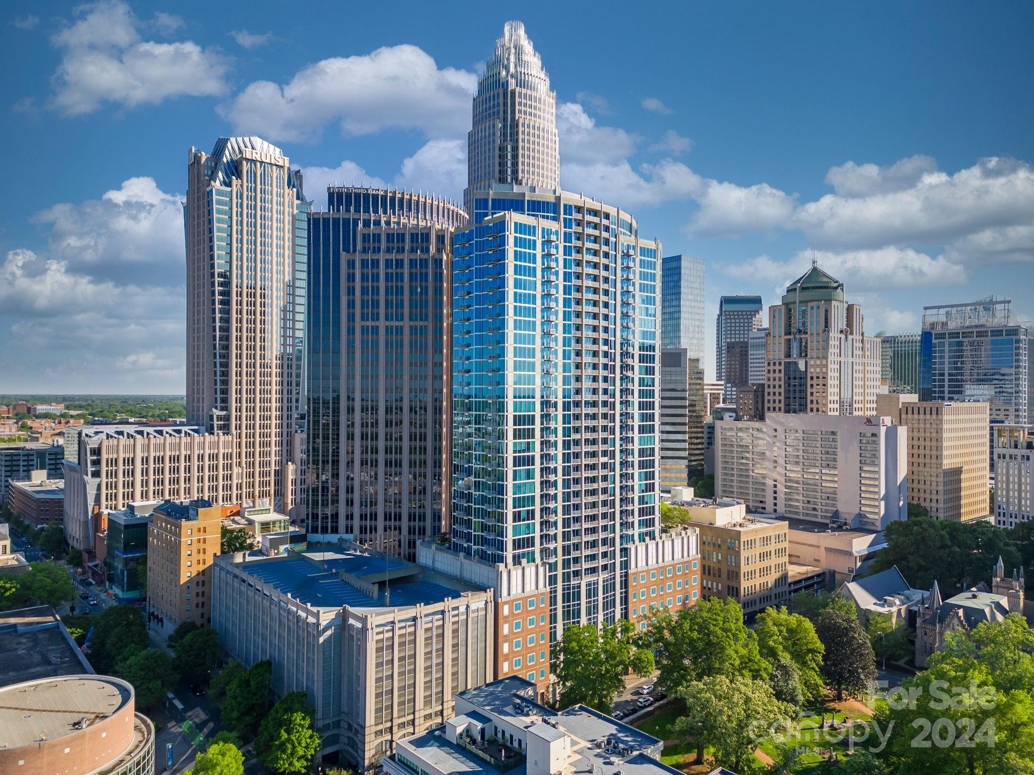 Experience urban living at its best in this stunning 1-bedroom, 1-bathroom condo on the 25th floor of one of Uptown Charlotte's most sought-after buildings. The open-concept layout creates a bright, inviting space, with floor-to-ceiling windows that showcase breathtaking city views. The modern kitchen features, stainless steel appliances, granite countertops, and ample storage. The bedroom offers a peaceful retreat with generous closet space, while the bathroom boasts sleek, contemporary finishes. Residents enjoy access to top-tier amenities, including a rooftop pool, a state-of-the-art fitness center, and a stylish common area. Located in the heart of the city, you’re just steps away from dining, shopping, and entertainment. Don’t miss the chance to make this luxury condo your new home!