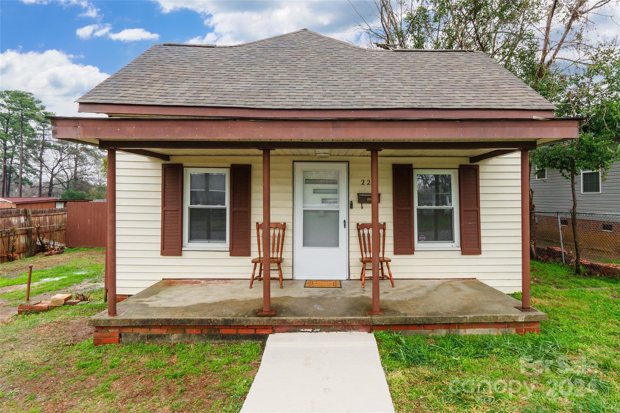 Step into the charm of this recently updated 2 bed, 1 bath home adorned with fresh neutral paint throughout. The newly revamped kitchen features freshly painted cabinets and brand-new Formica countertops, offering a delightful space. Outside, the spacious fenced yard invites you to relax and unwind, complete with a convenient workshop for your projects.  Rest easy knowing that the HVAC system was replaced in 2023 and a new roof was installed in 2024, providing peace of mind for years to come.  Situated conveniently near shopping and restaurants, and with no HOA, this home offers an ideal blend of comfort and convenience. Don't miss out on this opportunity for hassle-free living!