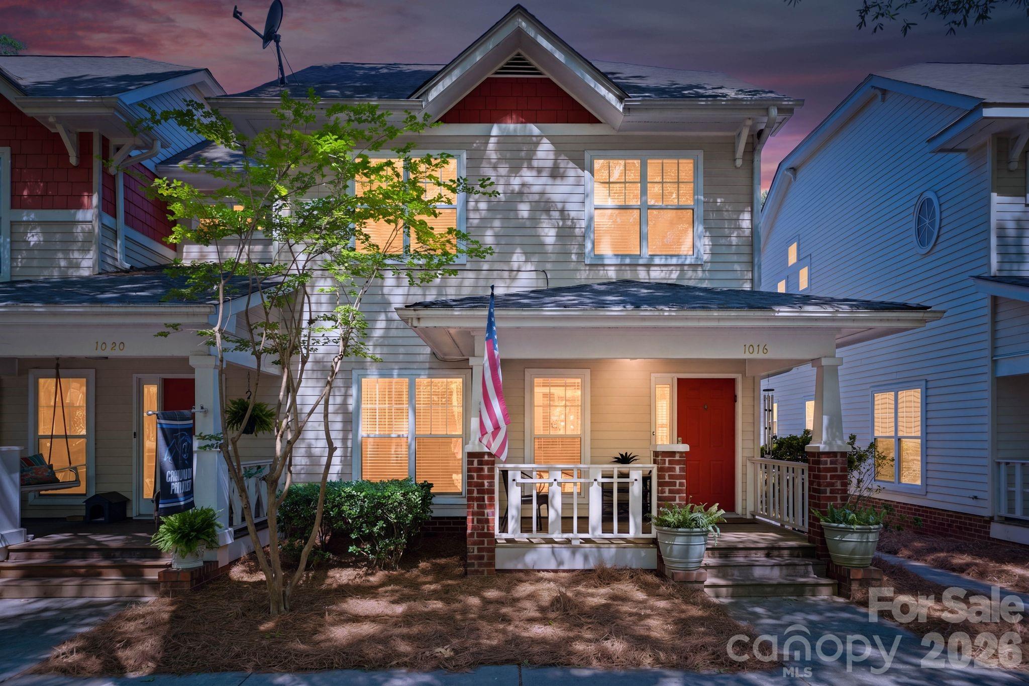 This is one of those homes that just feels right the moment you arrive.
Set along a quiet, tree-lined street just minutes from Uptown, 1016 W 1st Street offers that rare balance of charm, comfort, and easy, everyday living. The front porch sets the tone—an inviting place to start your morning with coffee or unwind in the evening, where the pace slows down and the neighborhood feels connected.
Inside, the home opens up in a way that feels both bright and natural. Light moves easily through the space, with the living area anchored by a fireplace that adds warmth without taking over. It’s comfortable, relaxed, and designed in a way that just makes sense.
The flow into the dining area and kitchen is seamless, making it just as suited for a quiet night in as it is for having friends over. The kitchen itself is clean and timeless, with a bit of personality—the kind of space where everything from a quick breakfast to a full evening gathering feels effortless. The island naturally becomes the center of it all.
What really stands out is how well the home lives beyond the interior. The backyard is tucked away, private, and shaded by mature trees—more of a courtyard feel than a traditional yard. It’s low-maintenance, quiet, and surprisingly peaceful for being this close to the city. Whether it’s a glass of wine in the evening or a casual weekend get-together, it’s a space you’ll actually use.
The detached two-car garage adds convenience without taking away from the outdoor space—something that’s not always easy to find in this location.
And then there’s the lifestyle. Close to Uptown, Bank of America Stadium, greenways, parks, and some of Charlotte’s best restaurants and nightlife, everything is right there. You can work, walk home, relax for a bit, and head back out for the evening—all without overthinking it.
That’s what makes this home different. Not just how it looks, but how it lives.