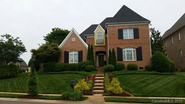 All brick home in exclusive gated community on Lake Wylie shows like a model home.  Gorgeous open floor plan w/formal dining room, living room could be 4th bedroom or study!  Awesome granite kitchen w/ work island, newer dishwasher, breakfast bar, microwave & tile backsplash.  All bathrooms have granite vanities.  Upstairs has 2 additional bedrooms and landing area.  Walk-in attic storage, oversized double garage, central vac, irrigation and security system.  Beautiful stamped stone back porch.