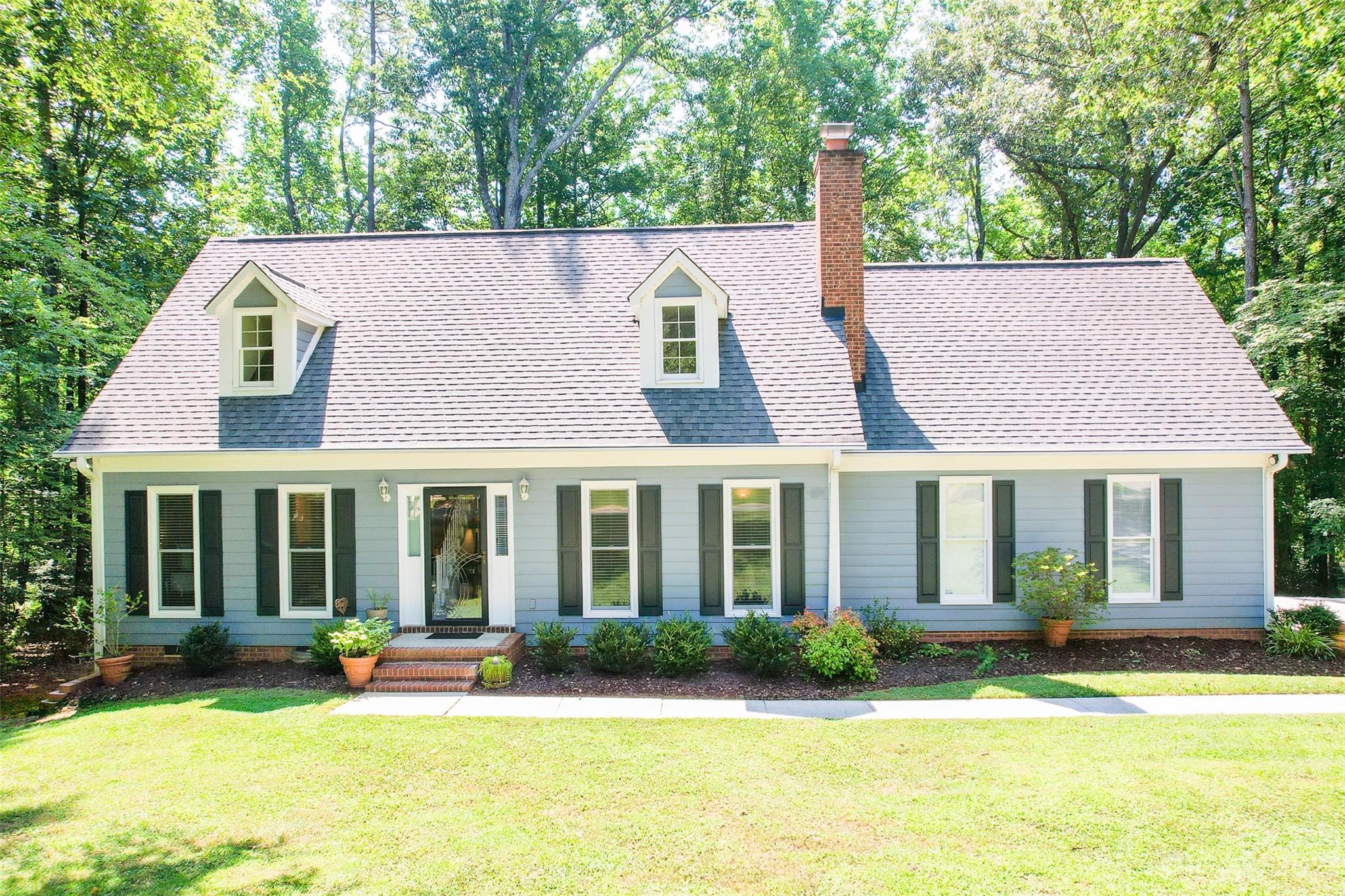 Welcome to Ballard Court, located in the highly sought-after Whiteville Park neighborhood in Fort Mill! With new carpet, fresh paint, remodeled upstairs bath and luxurious LVP flooring upstairs, this home is move-in ready. The main floor features a primary bedroom for convenience, along with an attached 2-car garage. Upstairs, you'll find  two large bedrooms and a spacious refinished office/bonus room, perfect for remote work! The home also boasts 2022 HVAC and 2018 tankless water heater! Enjoy the private backyard on the back deck!  Located in a friendly community with easy access to downtown Fort Mill restaurants, shops and entertainment AND excellent schools! Don't miss out on this incredible opportunity for a .44 acre private lot with no HOA. Schedule your showing today and experience the charm and convenience of this stunning home!

Seller will be accepting offers through 12:00p on 7/17 and will review after.