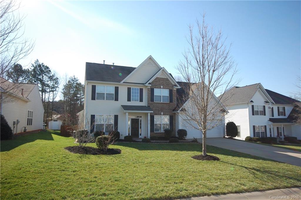 WOW! Such a wonderful home in desirable Legacy Park in Indian Land. You'll love the detailed appointments in this home from the wood & tile flooring to the extensive trim work, including crown molding, chair rail & wainscoting, from the granite counter tops & tile backsplash in the kitchen to the tile surround shower in the owner's suite. There is a bedroom w/full bath on the main floor and 3-4 bedrooms on the 2nd floor. The 4th bedroom can be your large bonus room. Paver patio & fenced yard.
