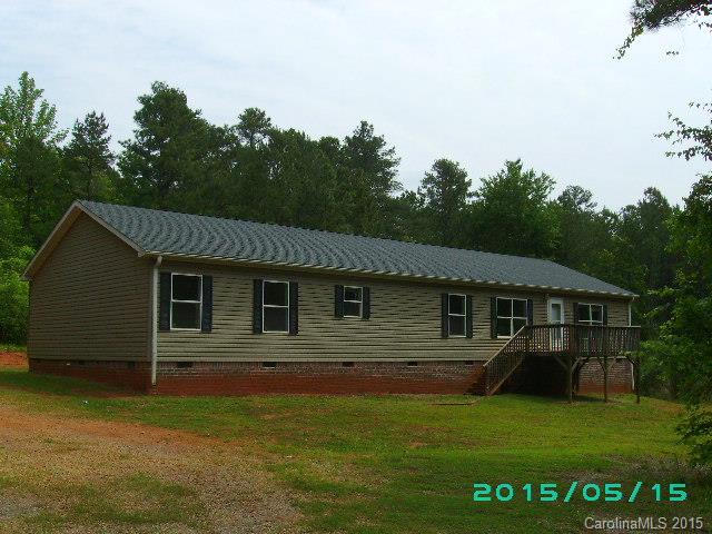 Not your average modular, but enormous home in the country!  Private location , over 4 acres of wooded land .
Mechanical s have been removed, inc well head , home will need repair.