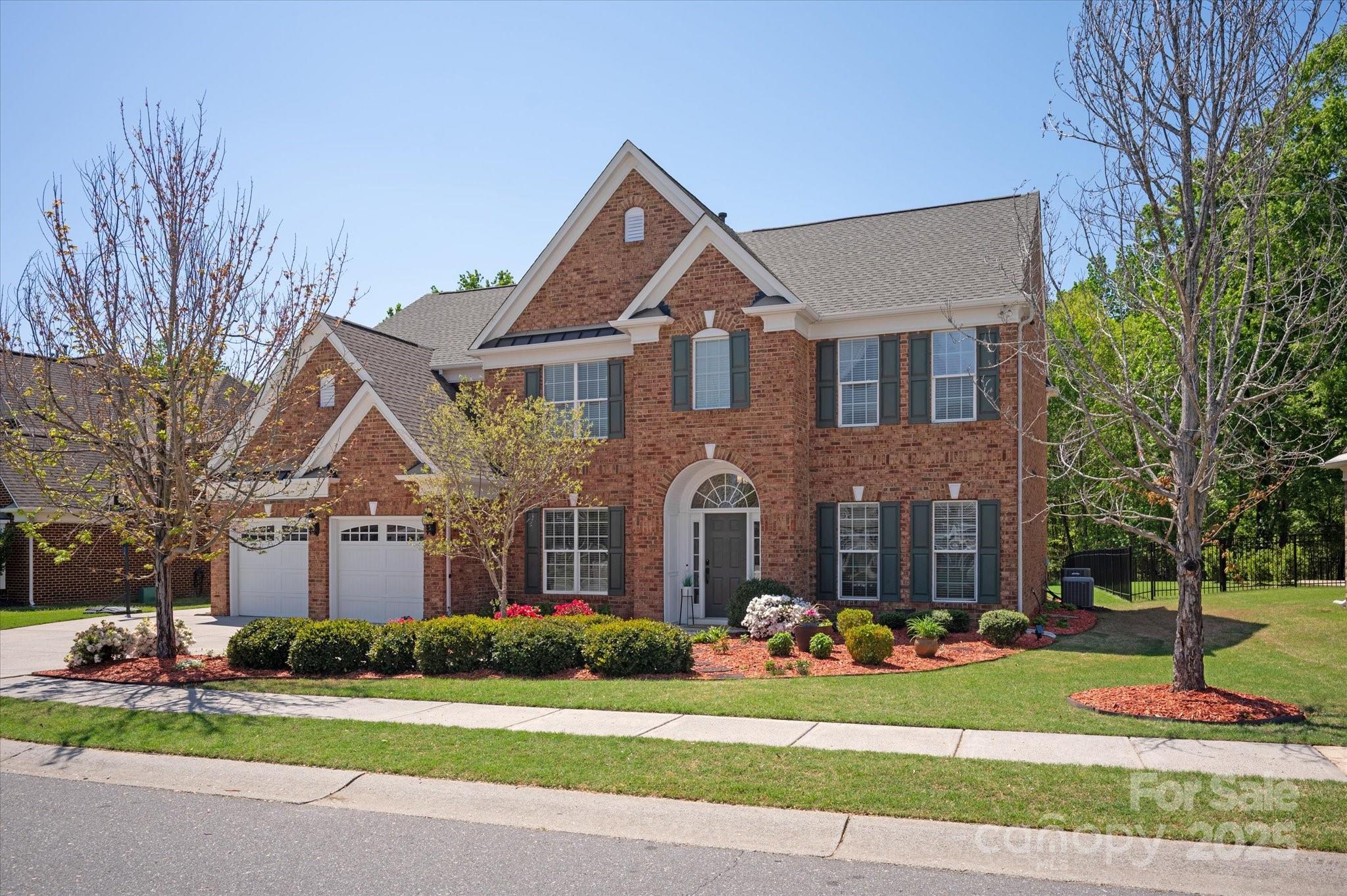 Stunning, move in ready Evanshire model in the highly desirable Chimneys of Marvin. Beautiful, private & flat lot that backs up to woods. Oversized custom covered porch with fireplace and plenty of room for entertaining. First floor dedicated office, dining and guest suite with access to a full bath. Open concept gourmet kitchen & 2 story great room with fireplace. Plenty of cabinets with center island, ss steel appliances, granite counters & computer niche. 2nd floor primary features a separate flex space, perfect for an exercise room, office or nursery. Spa like bath with soaking tub, separate shower & walk in closet. 2nd floor jack n jill bedrooms plus an additional bedroom with dedicated full bath. Incredible neighborhood amenities to include pool with waterslide, separate tot pool, tennis, volleyball & basketball courts, clubhouse & playground. Award winning Marvin Ridge Schools! 3 car garage and cul de sac location. Freshly painted!